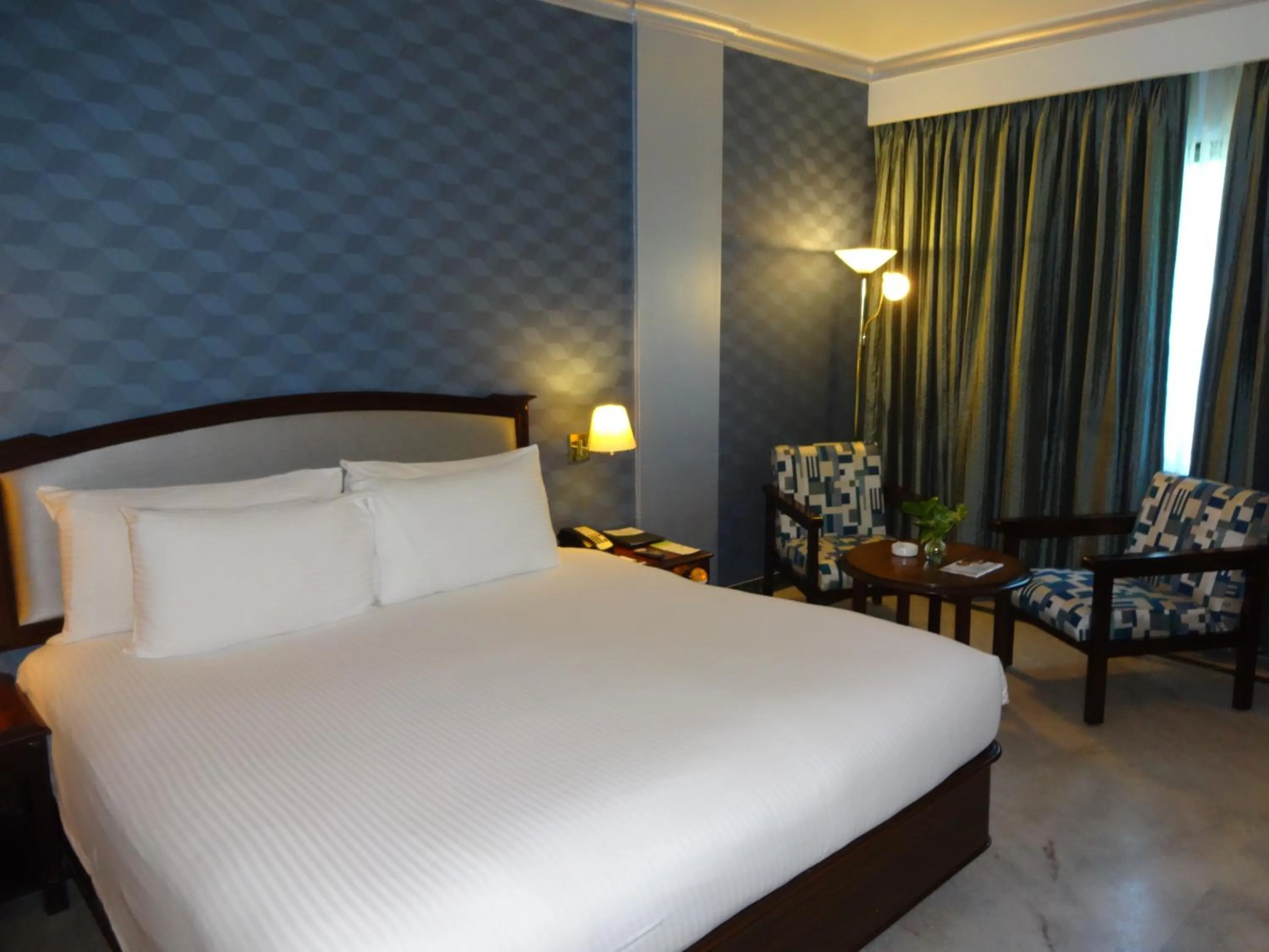 Photo of the whole room, Bed in Radha Regent, Chennai