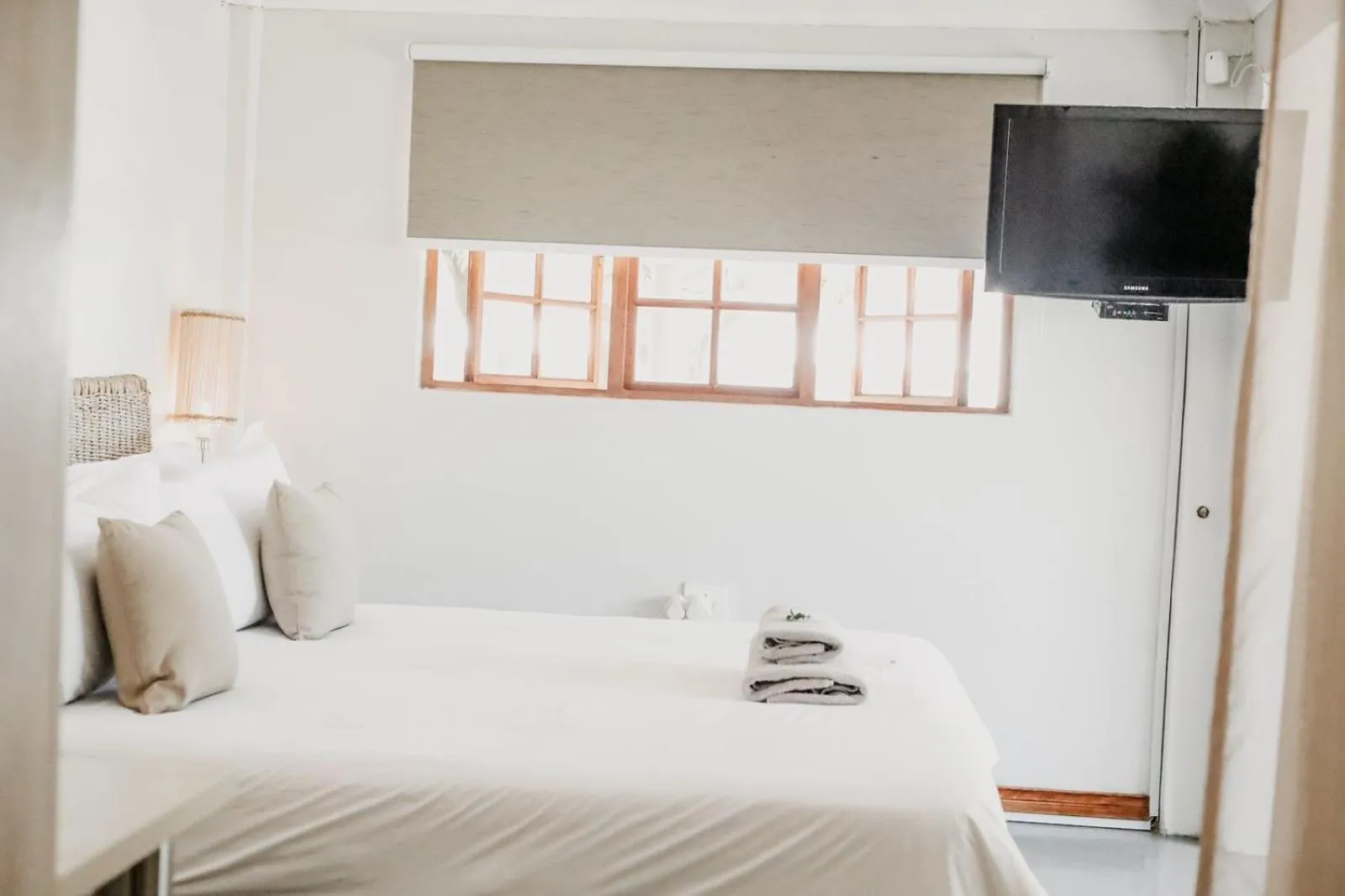 Bed in Lighthouse Guesthouse & Cafe