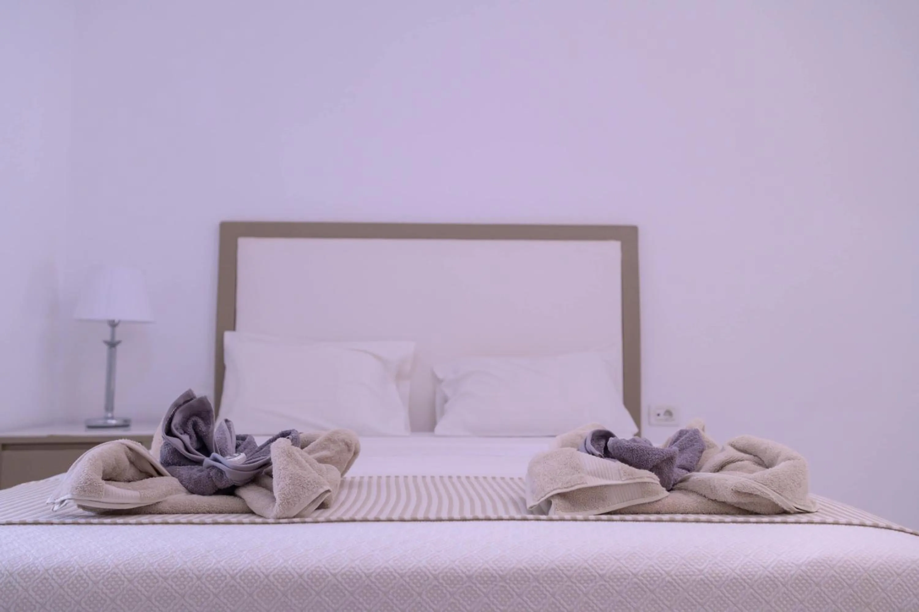 Bed in Elizabeth Suites