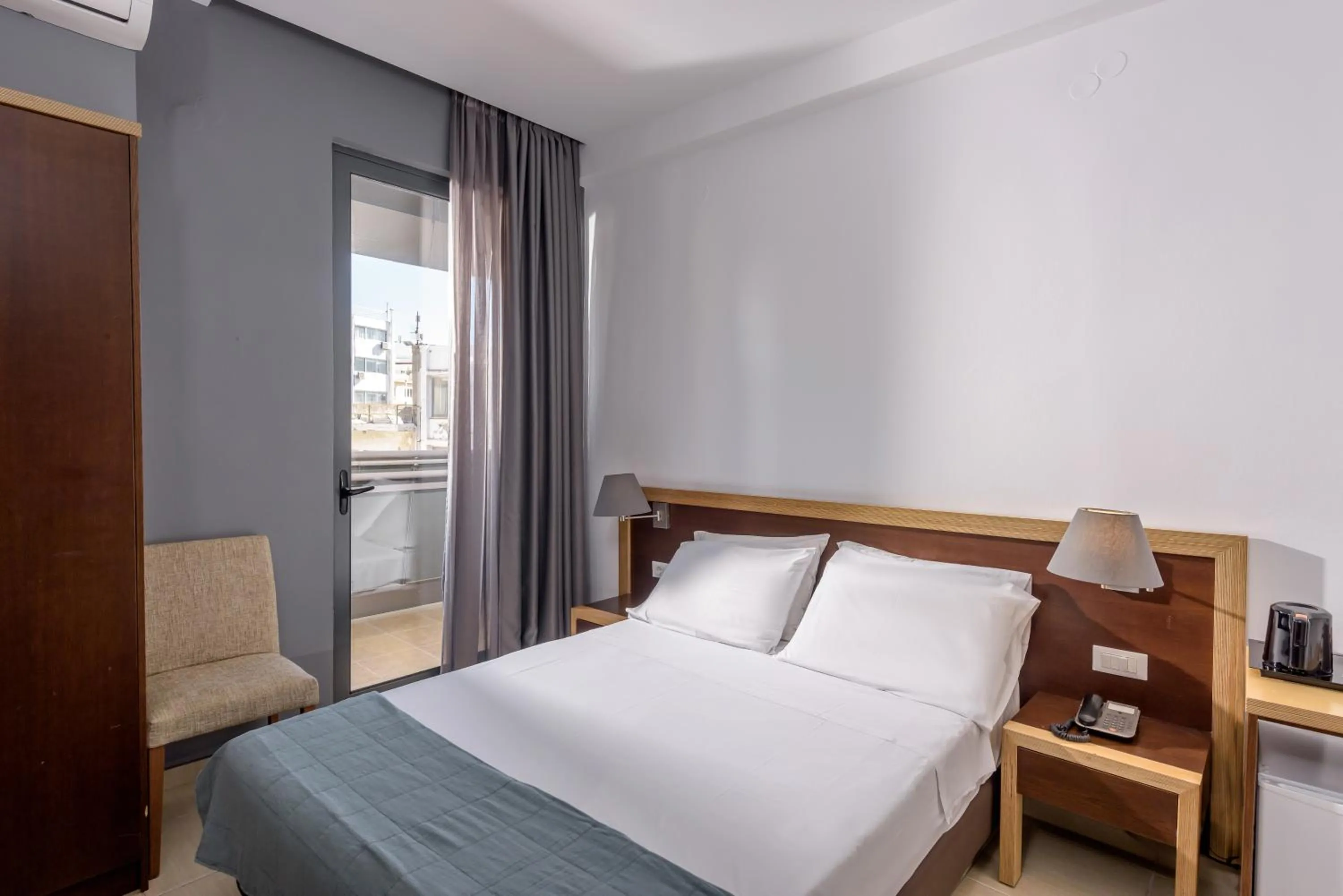 Photo of the whole room, Bed in Iraklion Hotel