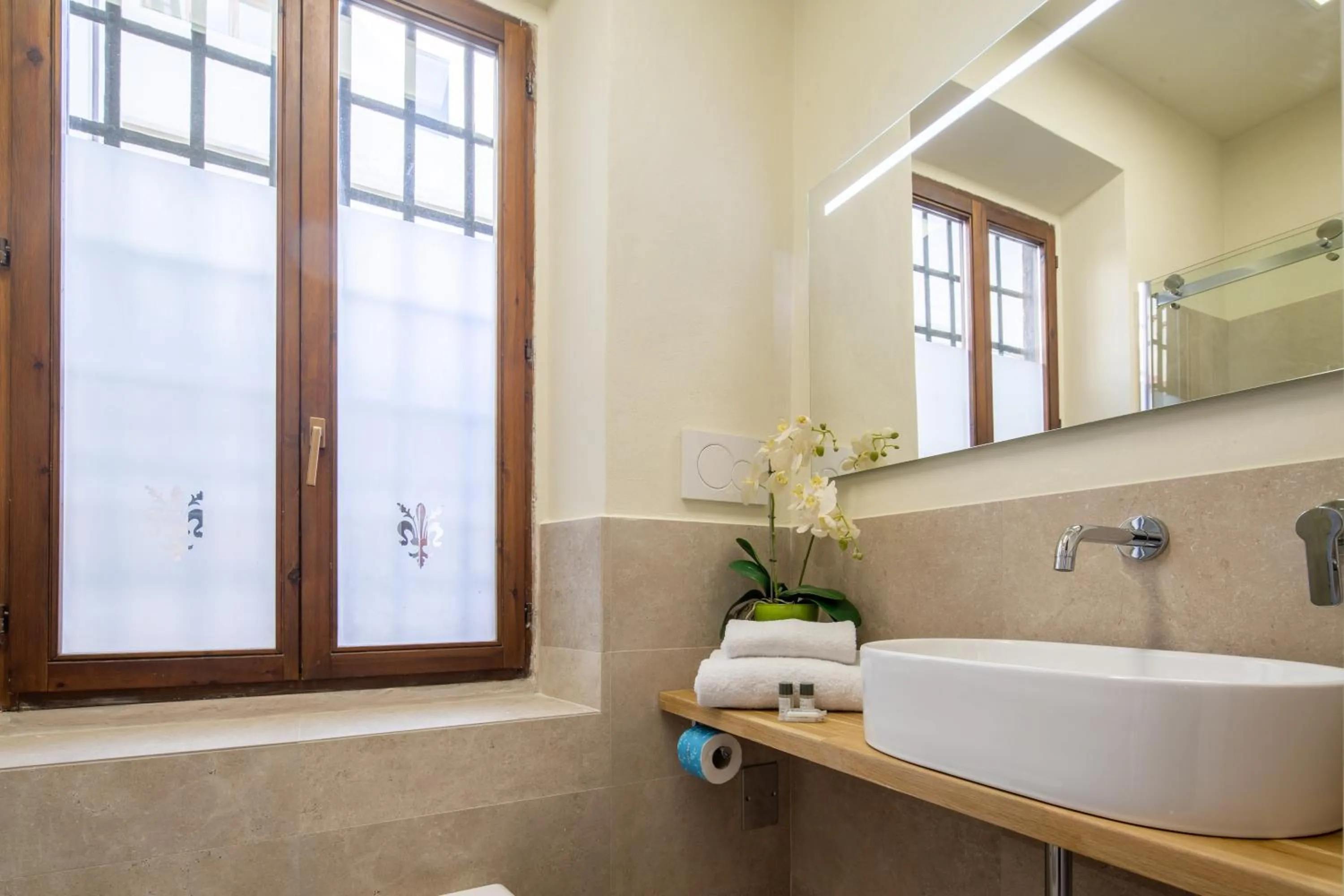Bathroom in Duomo Apartments by Mmega