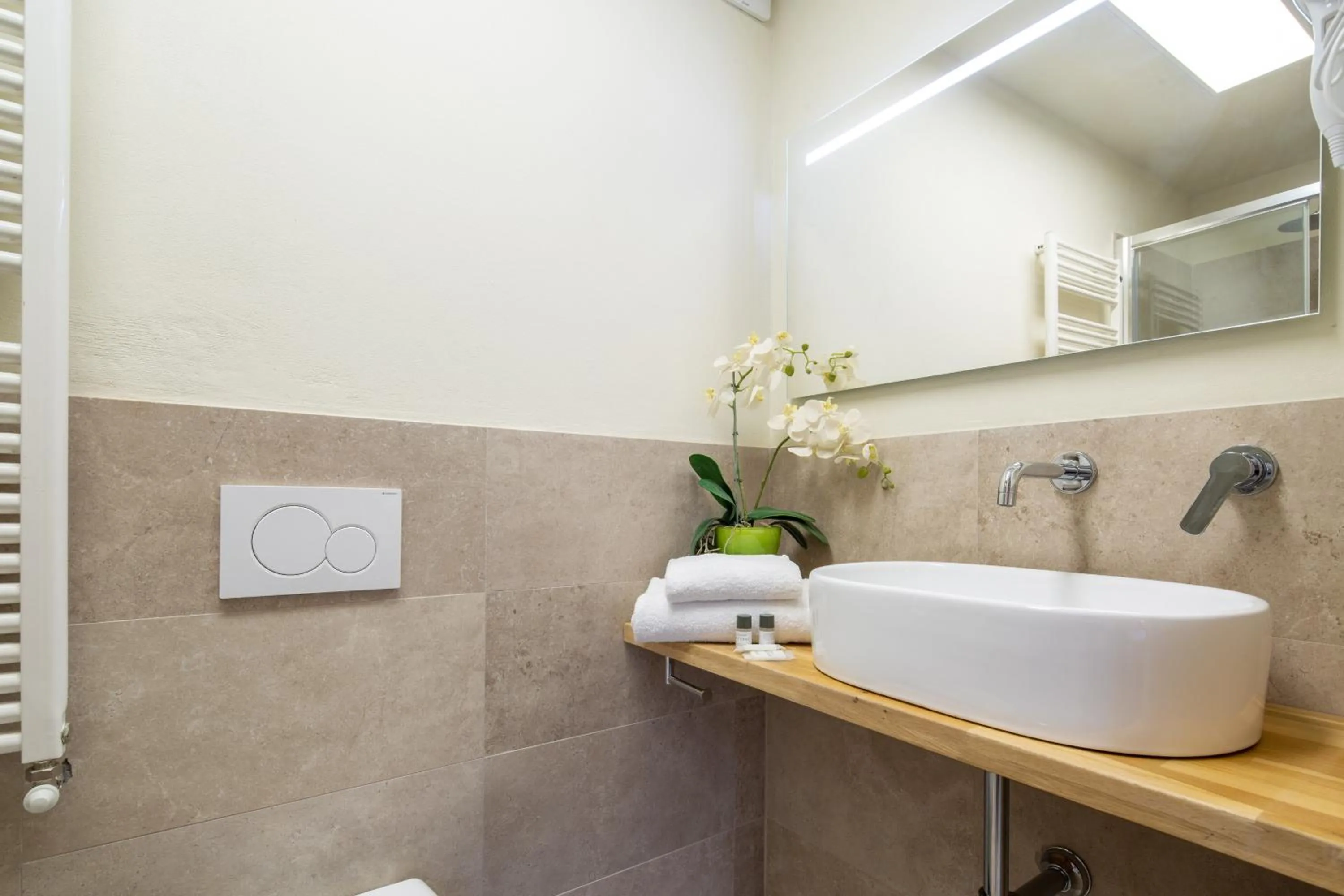 Bathroom in Duomo Apartments by Mmega