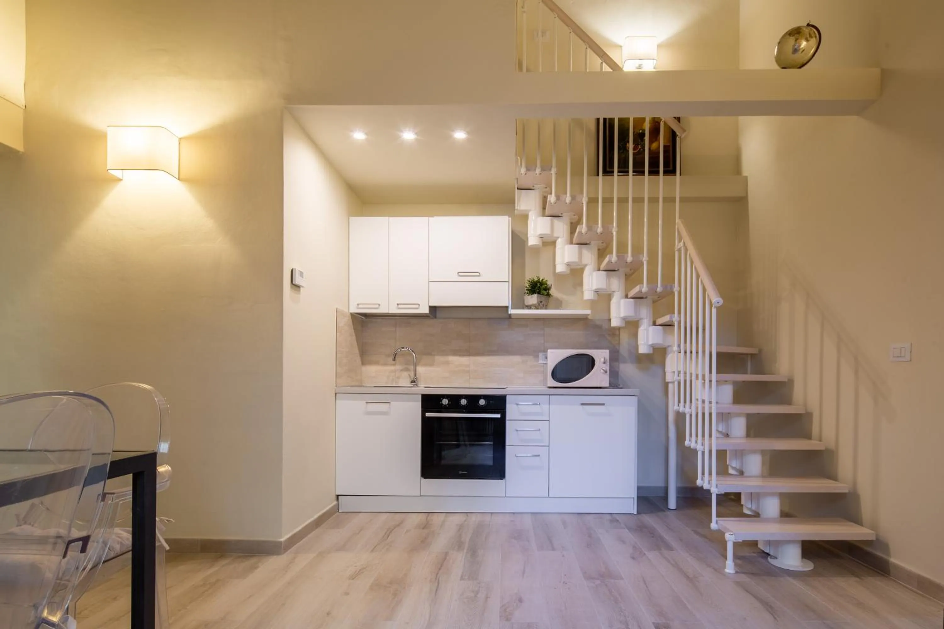 Kitchen or kitchenette in Duomo Apartments by Mmega