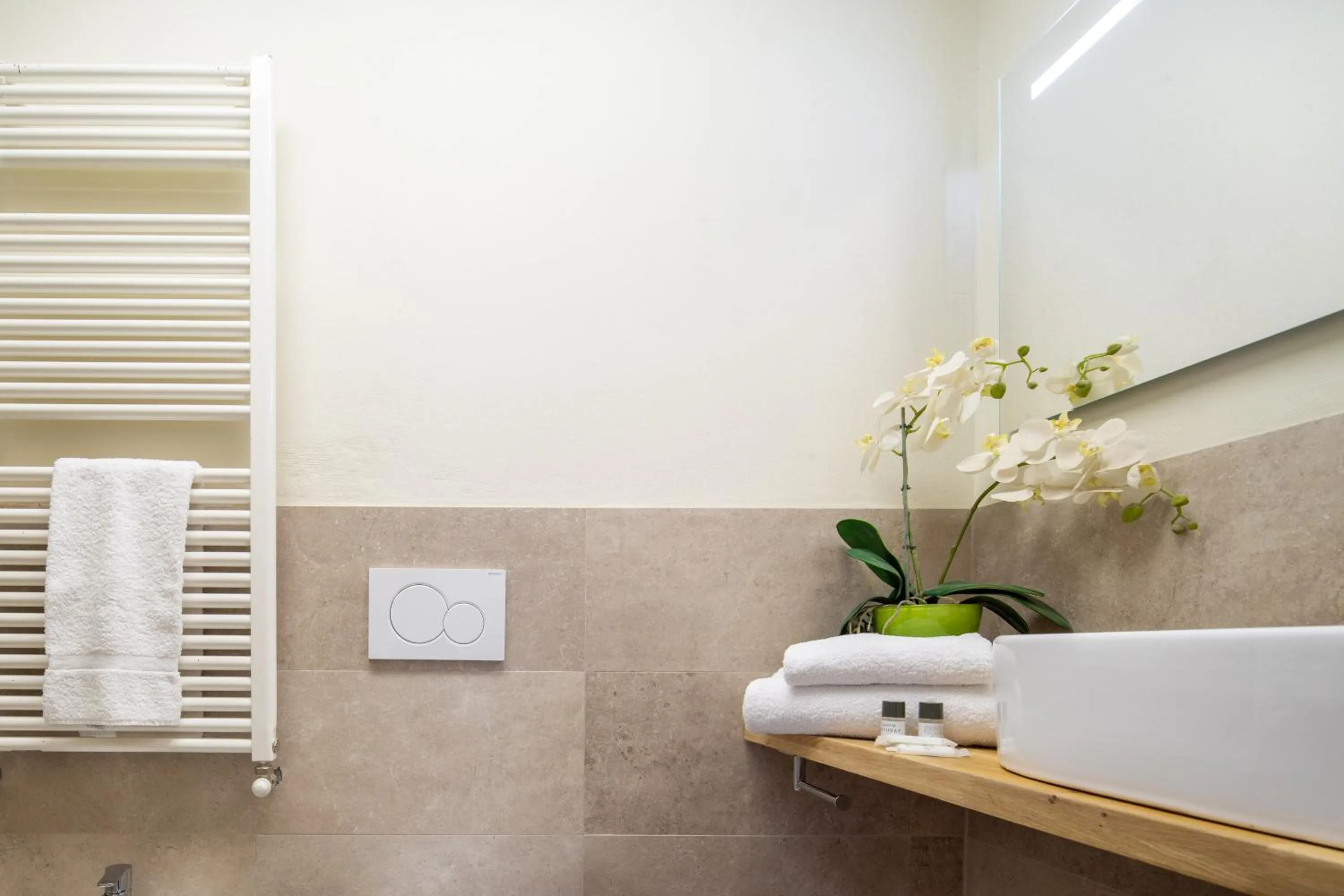 Bathroom in Duomo Apartments by Mmega