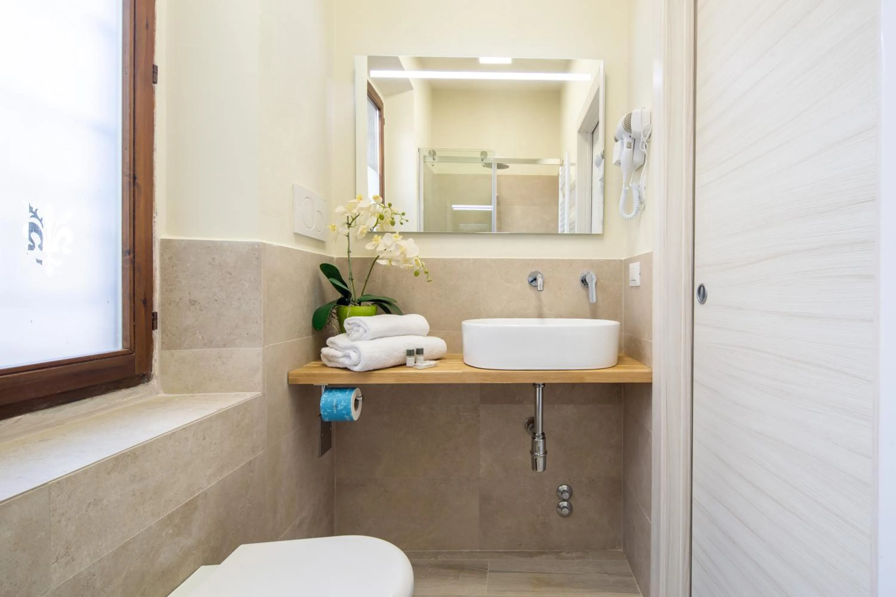 Bathroom in Duomo Apartments by Mmega