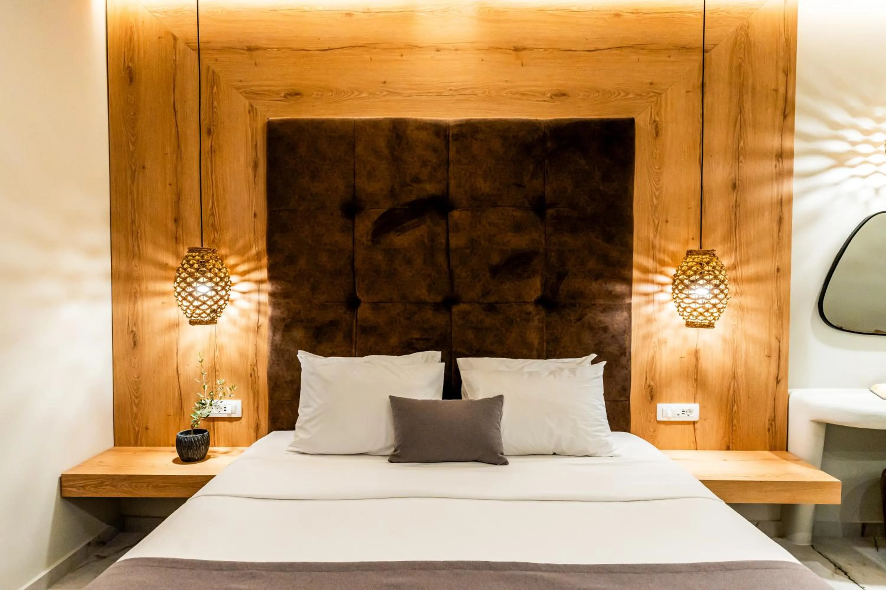 Bed in Perla Nera Suites