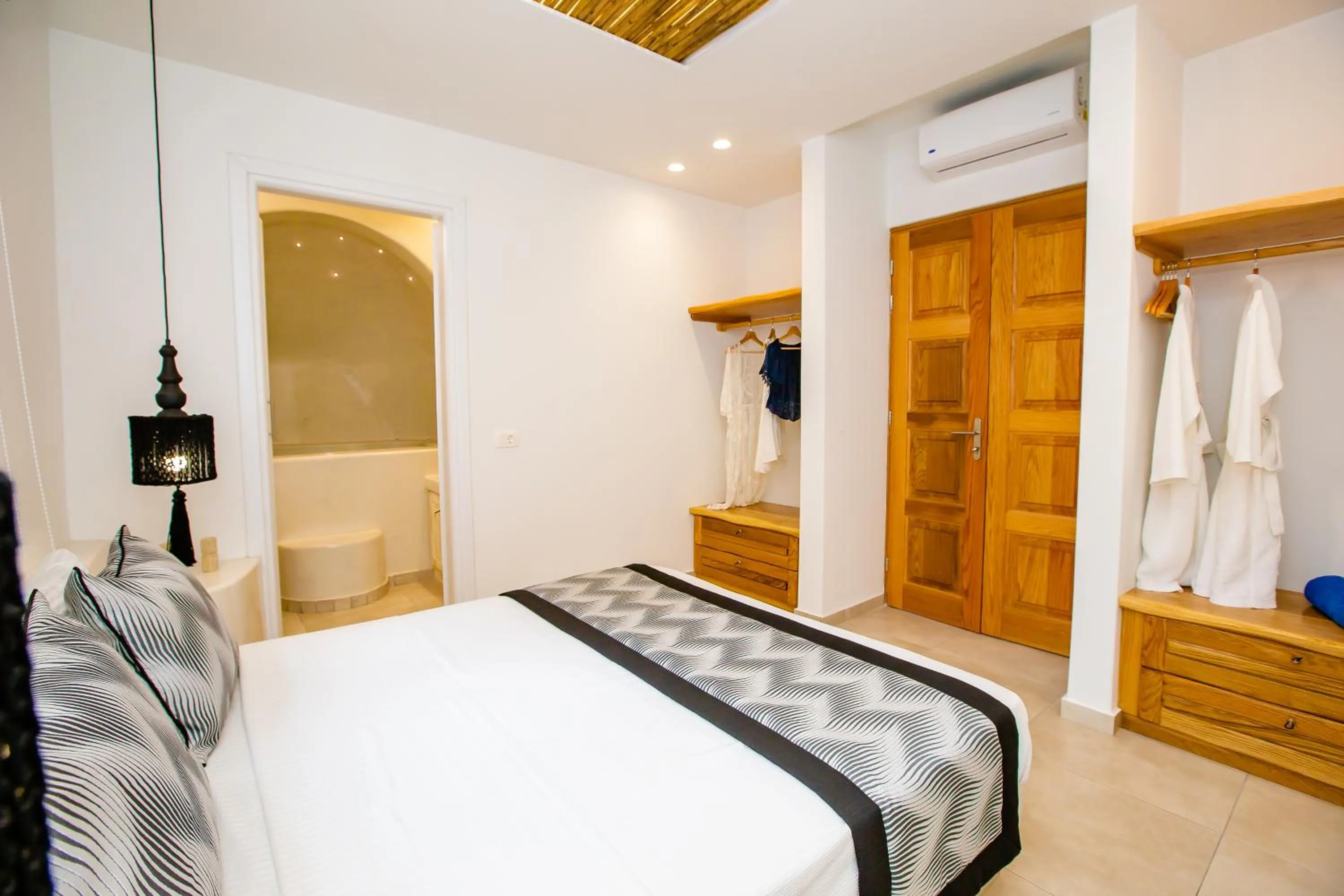 Bed in Perla Nera Suites