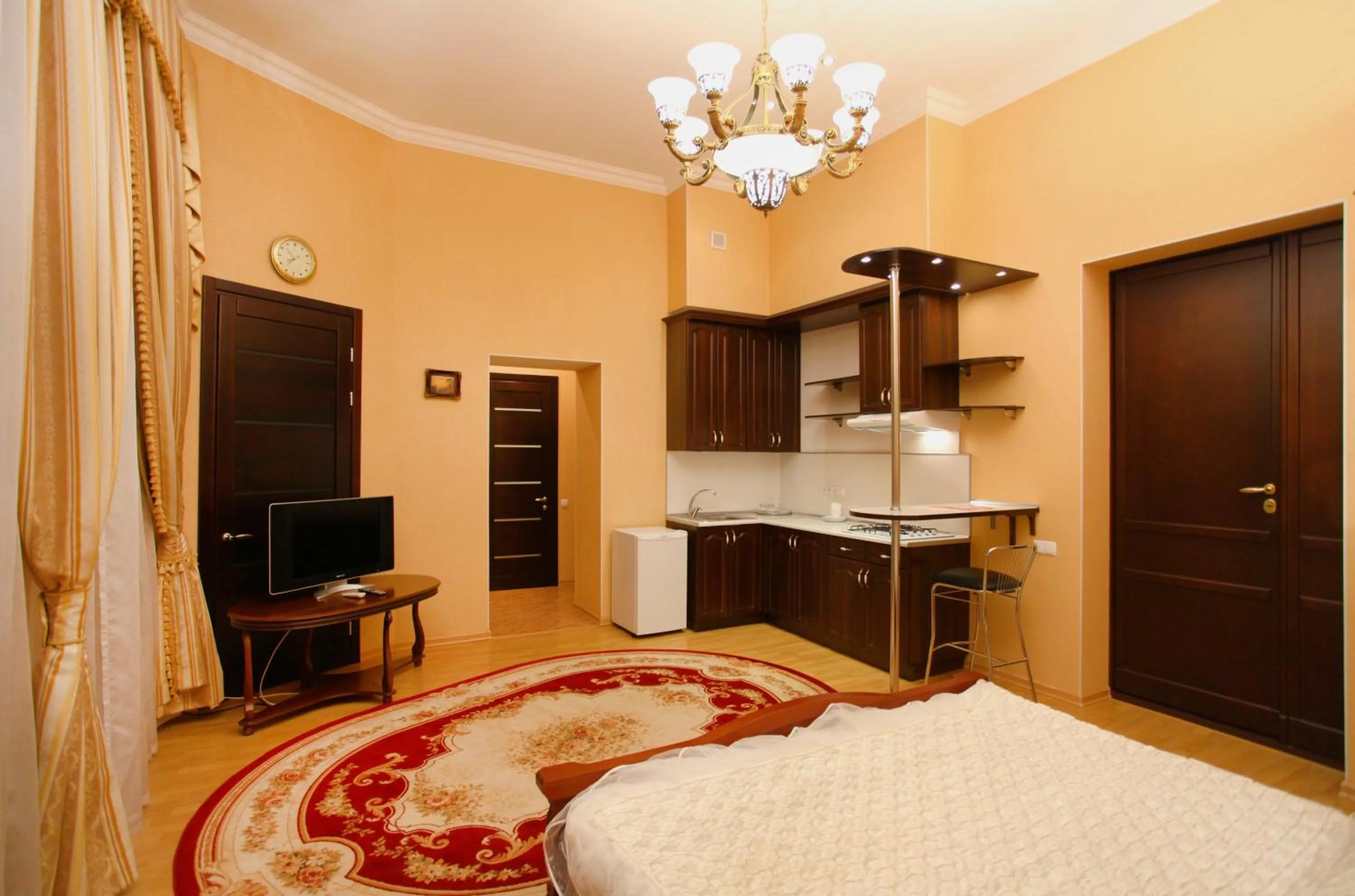 Kitchen or kitchenette, Bed in Ekaterina Hotel