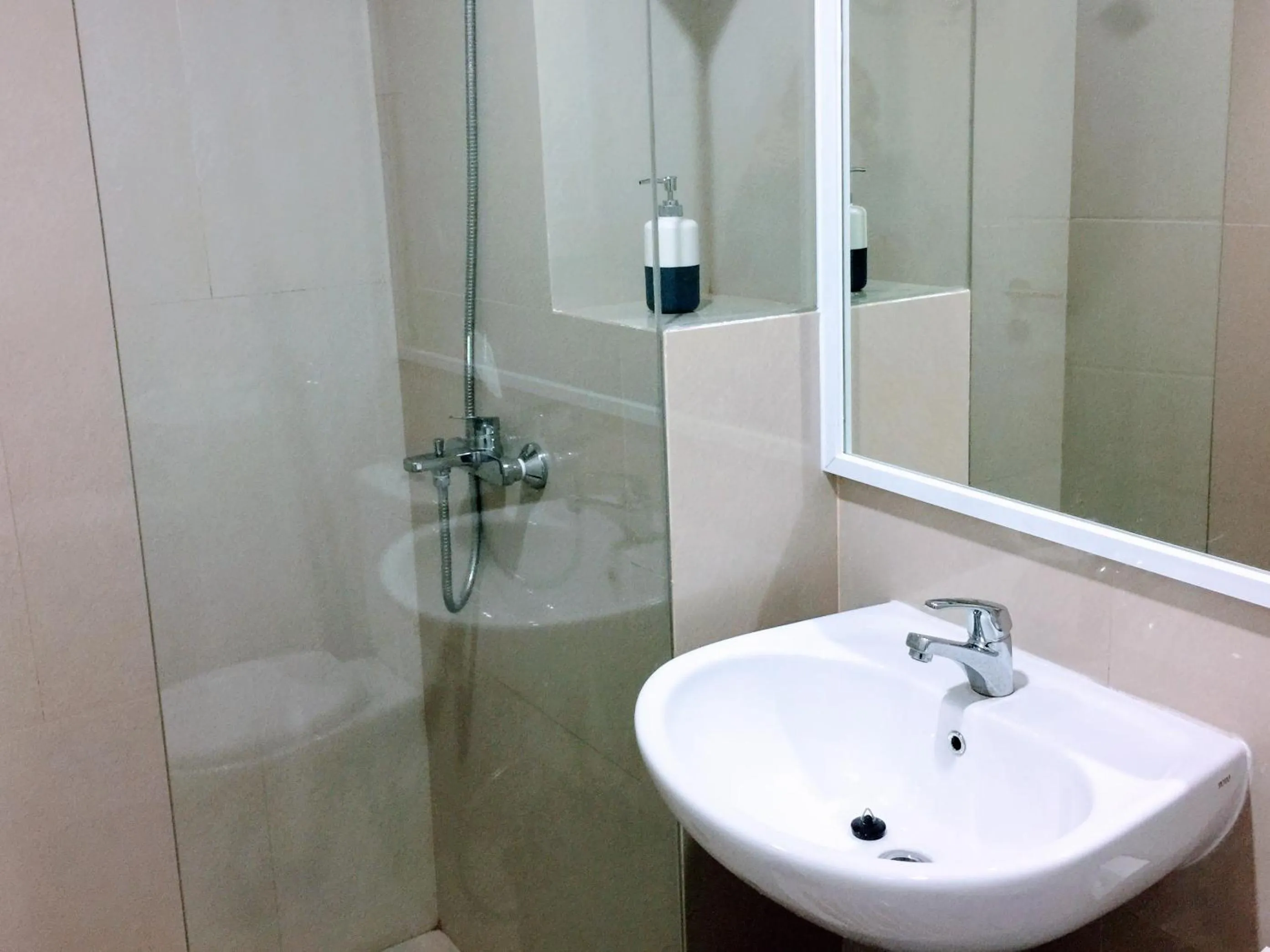 Bathroom in TechieRoom Kotlin at Clove Garden Residence