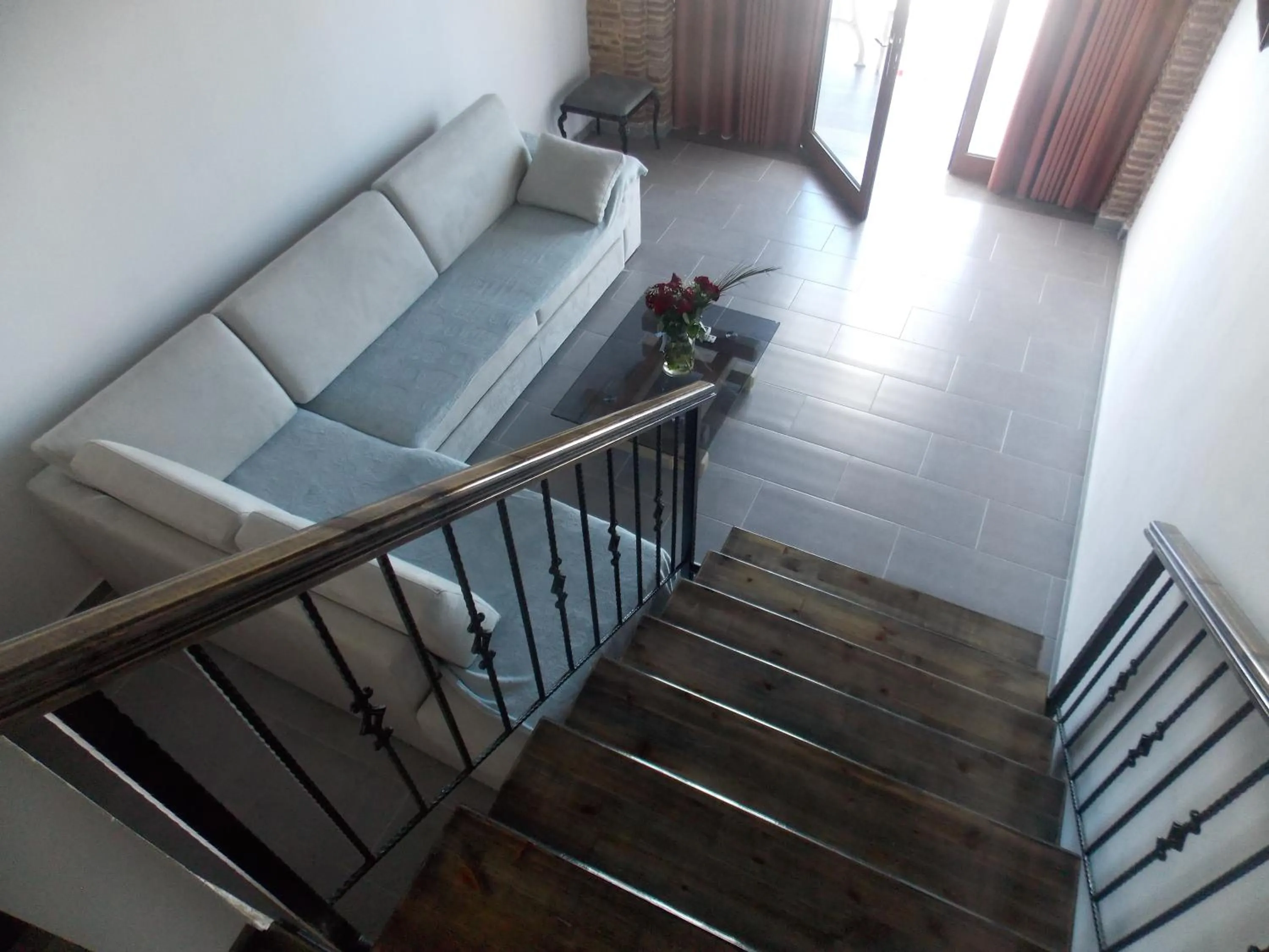 Living room, Bed in Sunset Suites