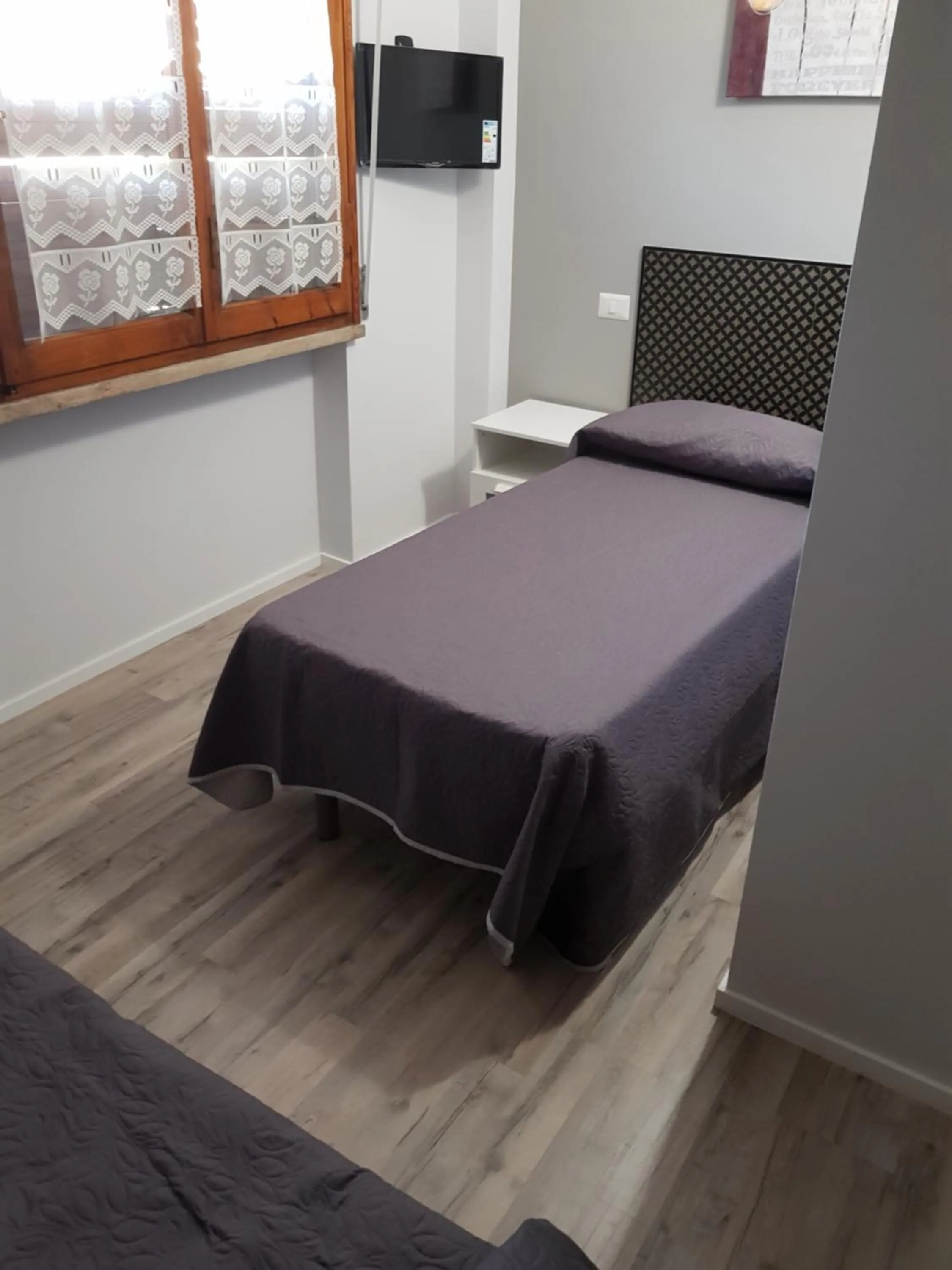 Bed in Affittacamere Umberto I