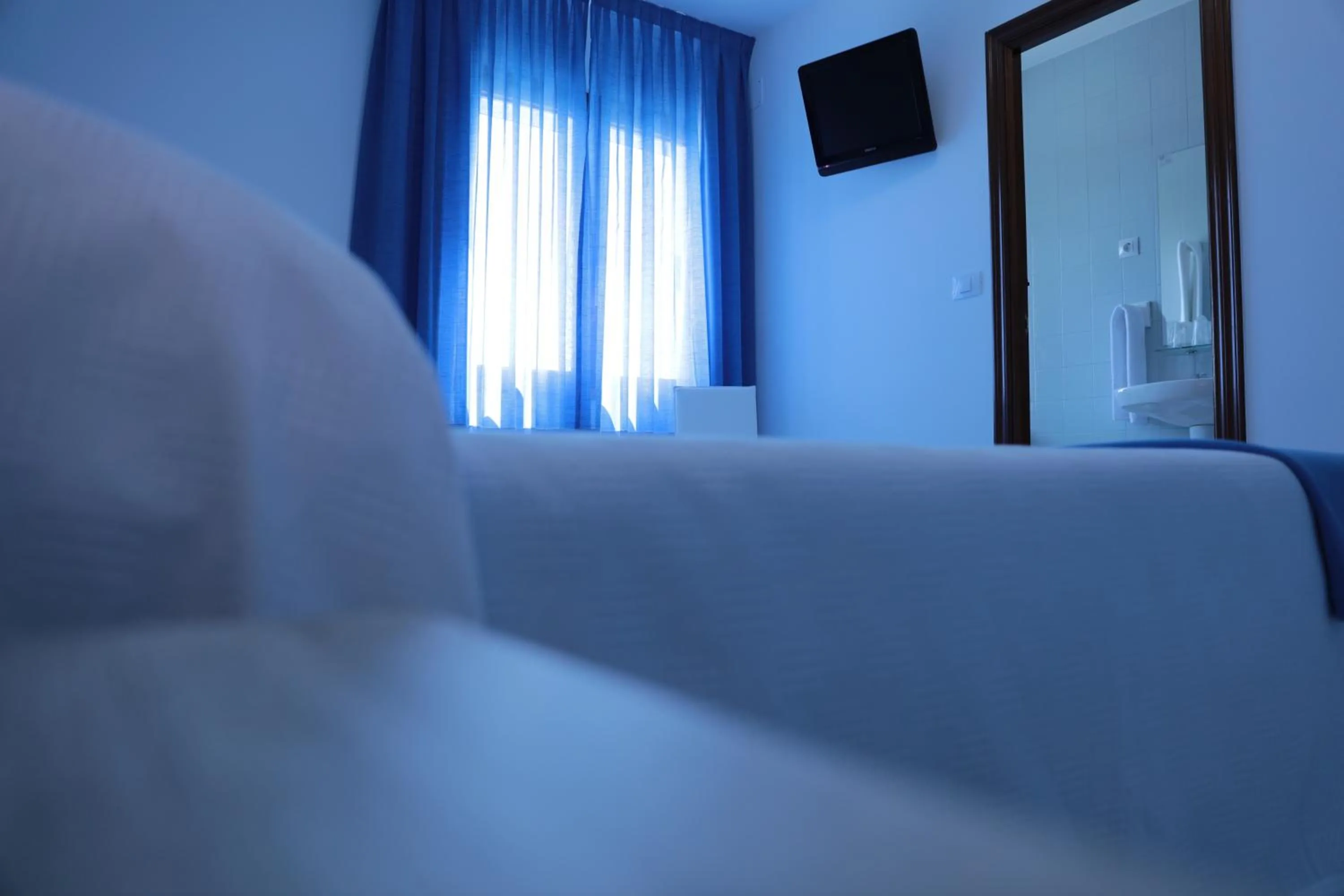 Photo of the whole room, Bed in Hotel Playa de las Catedrales