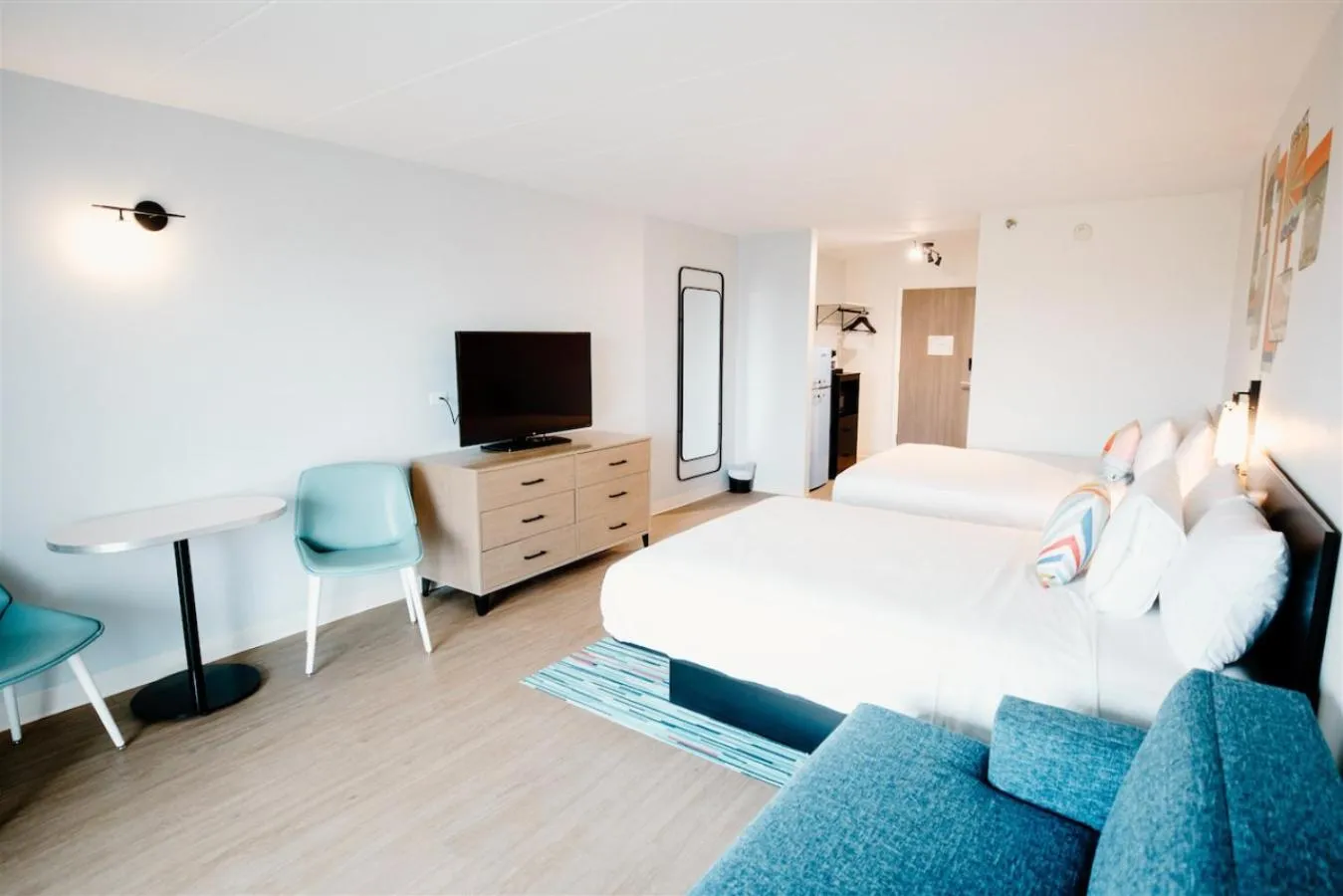 Bed in SeaLoft Oceanfront Hotel