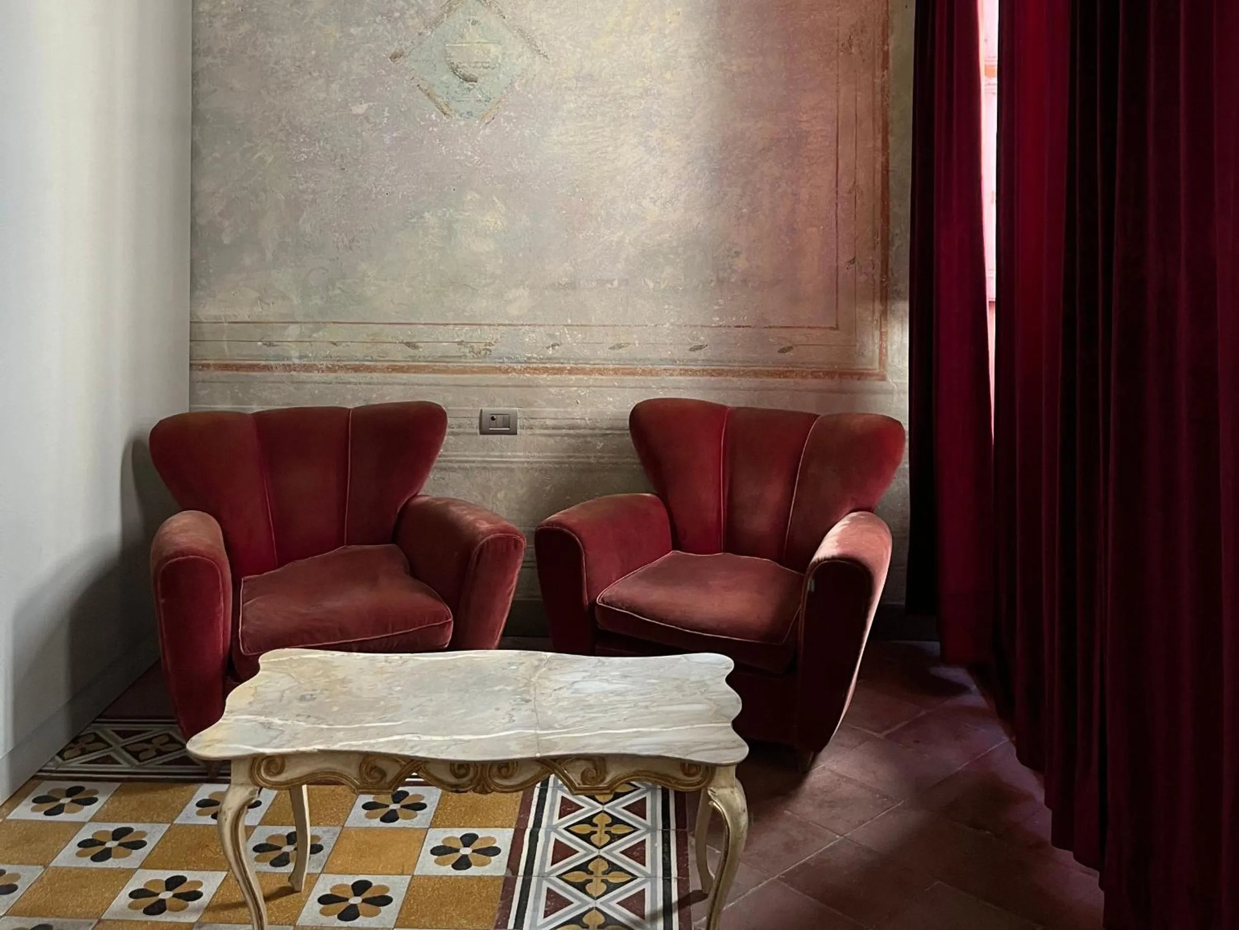 Living room in Numa Florence Palazzo San Niccolò