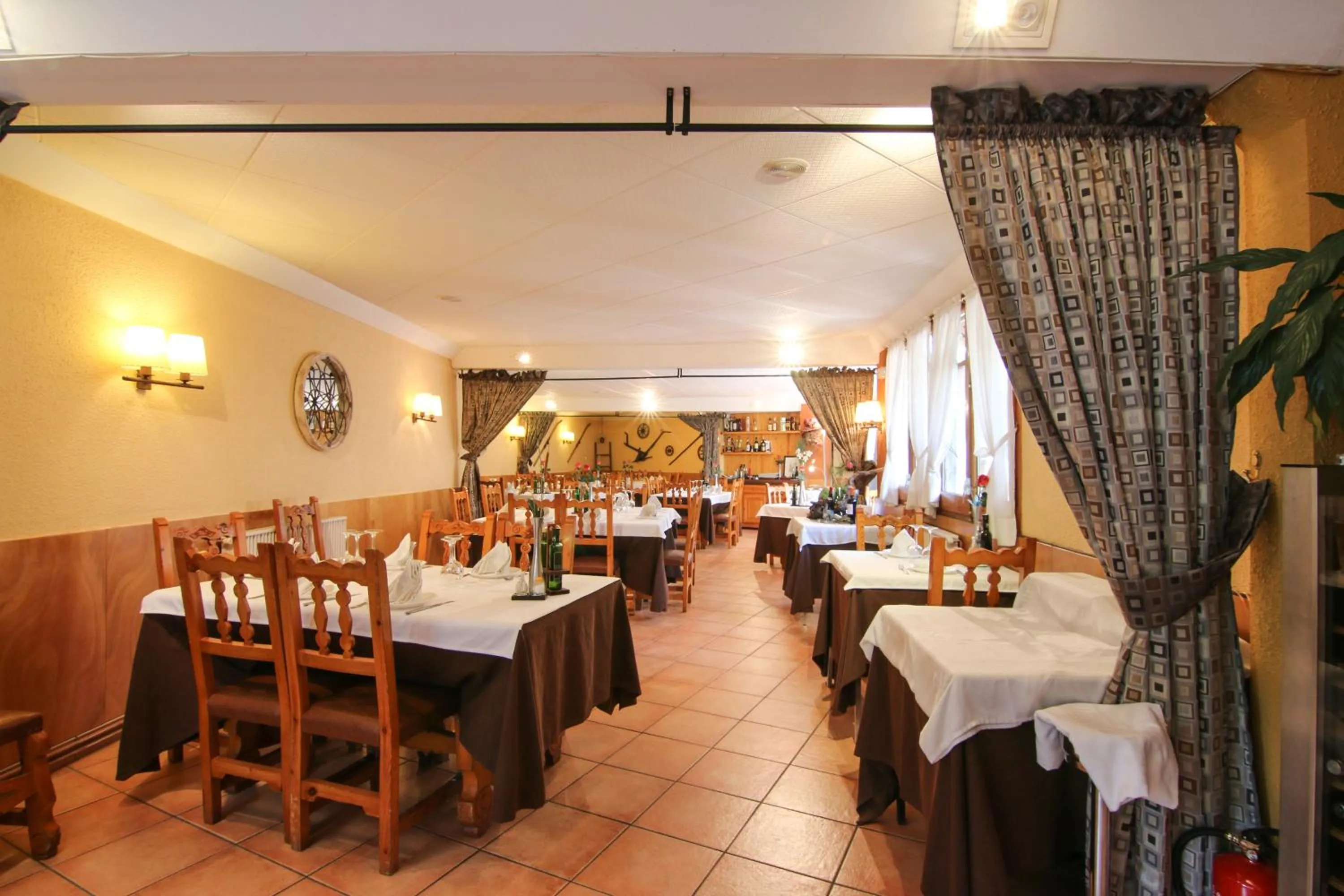 Communal lounge/ TV room in Roch Hotel