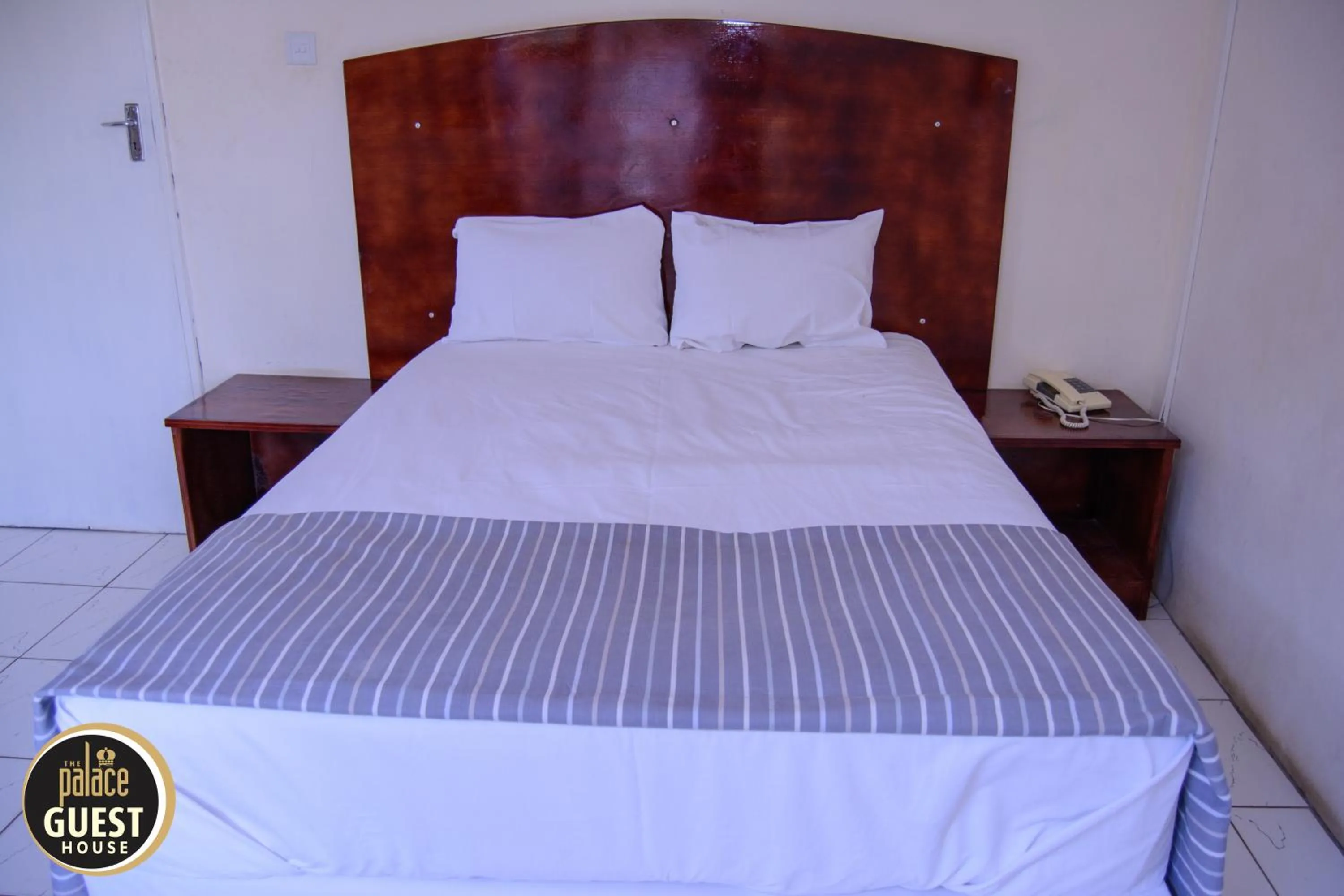 Bed in The Palace Guest House