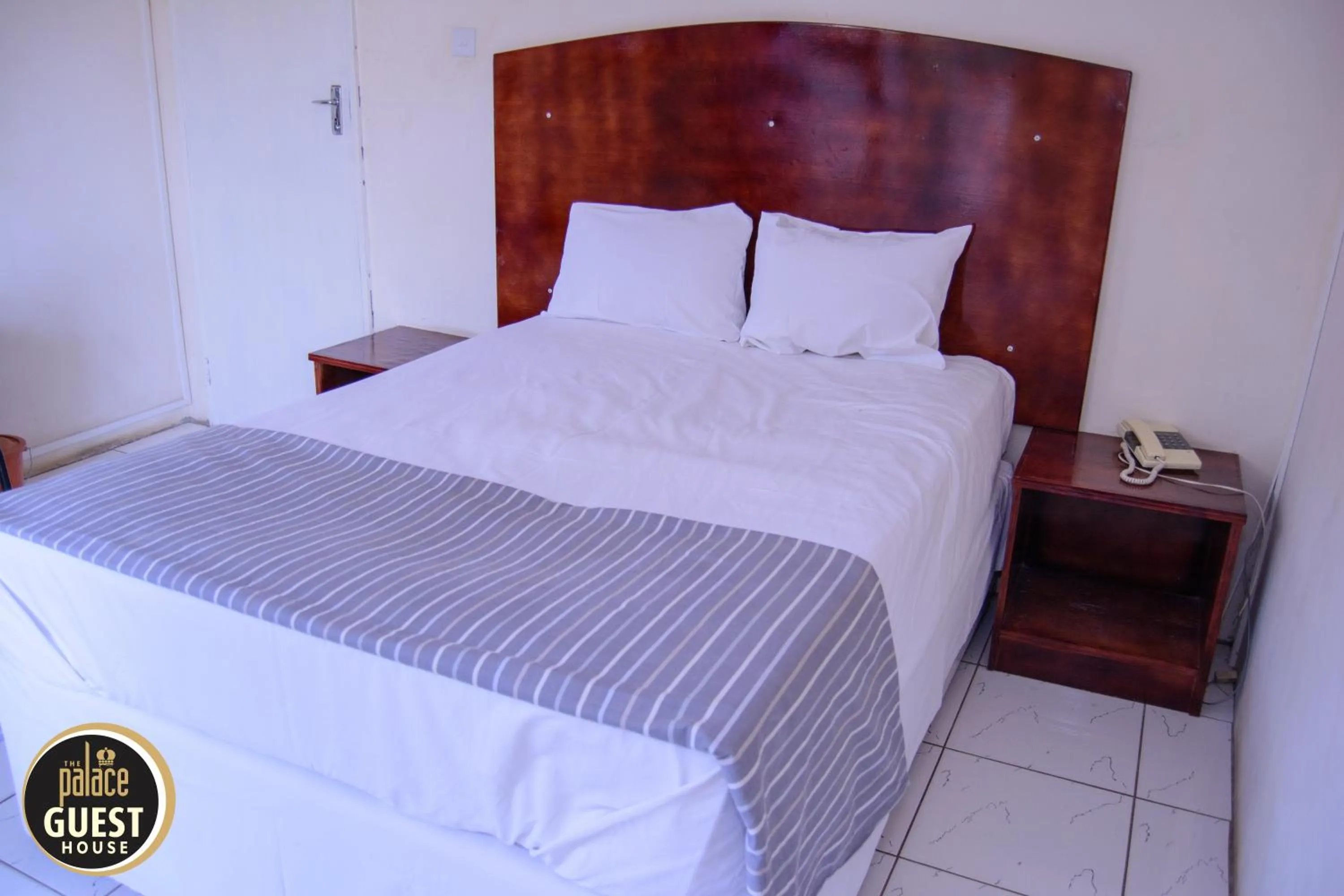 Bed in The Palace Guest House