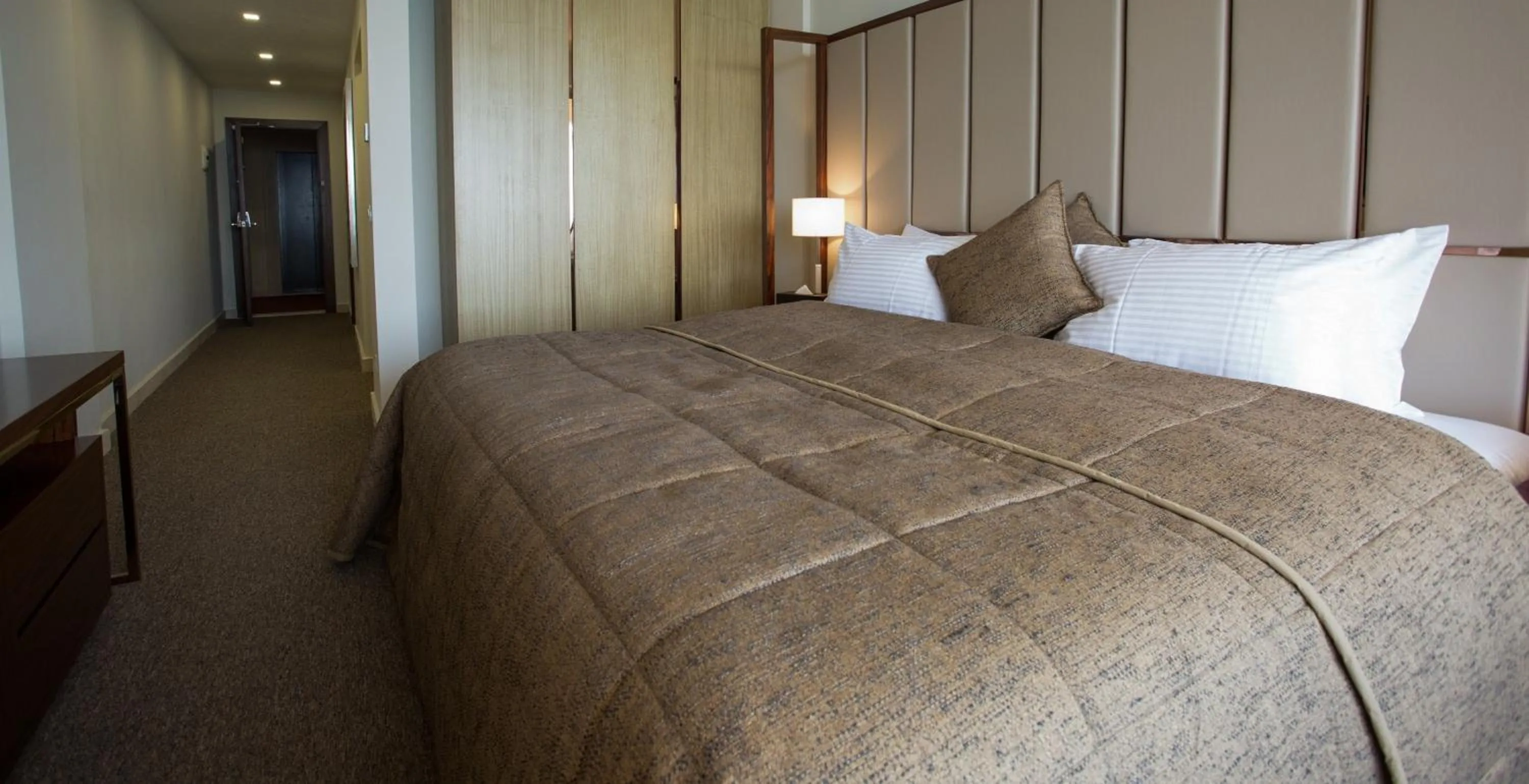 Bed in The Rooms Boutique Hotel