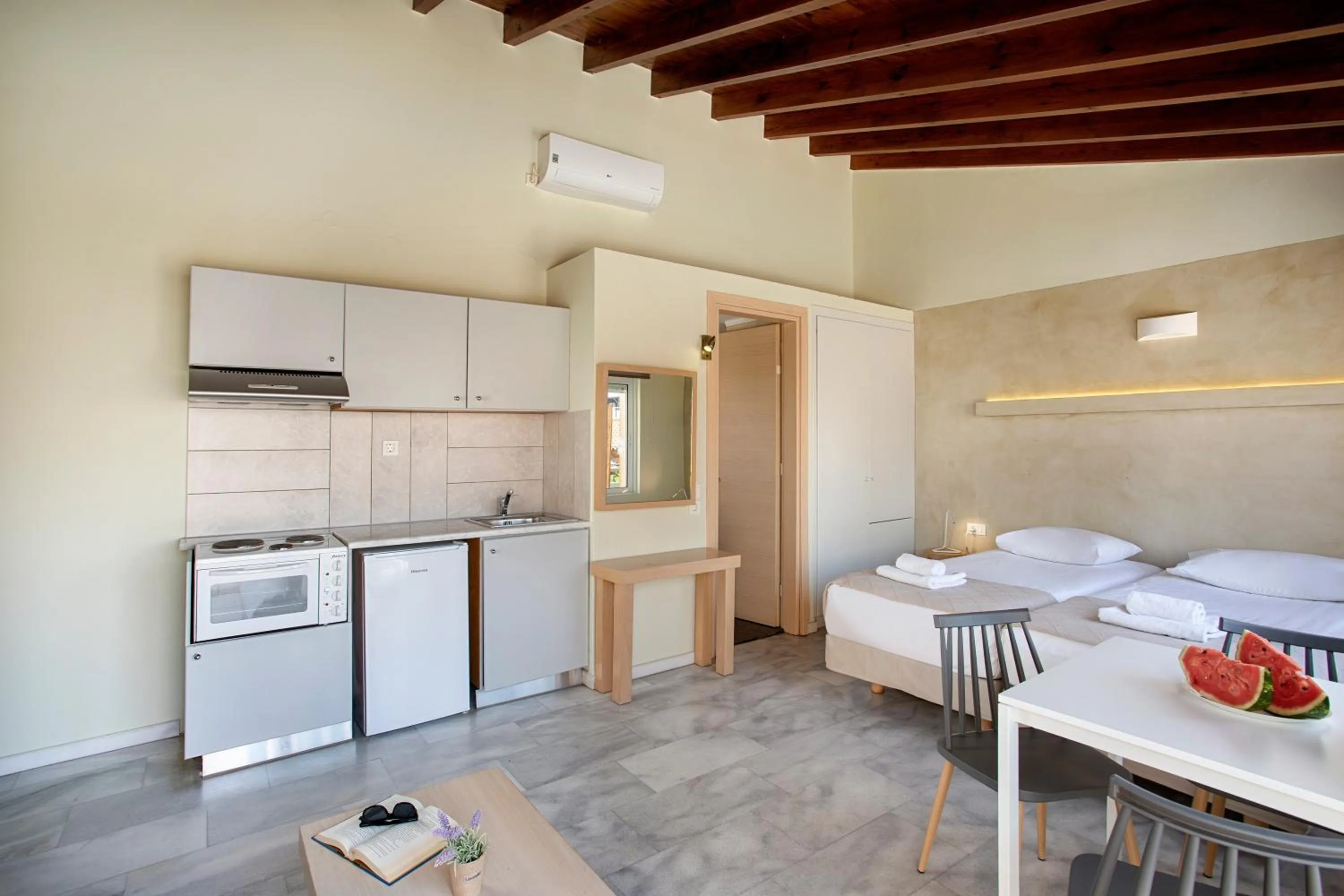 Bed in Elma's Dream Apartments & Villas