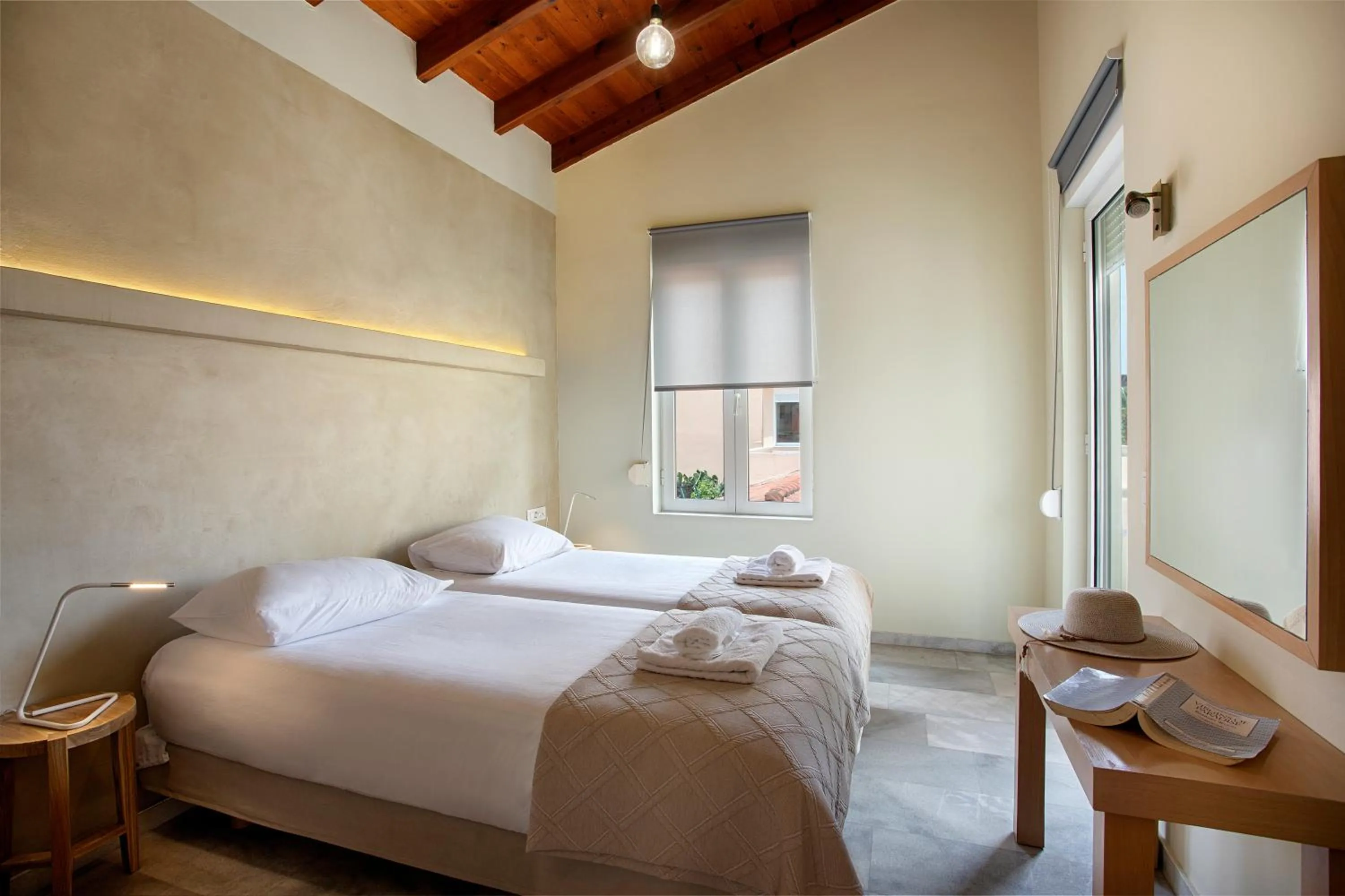 Bed in Elma's Dream Apartments & Villas