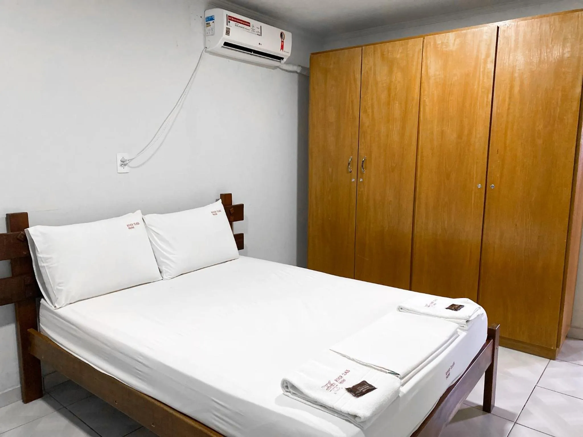 Bed in River Class Hotel