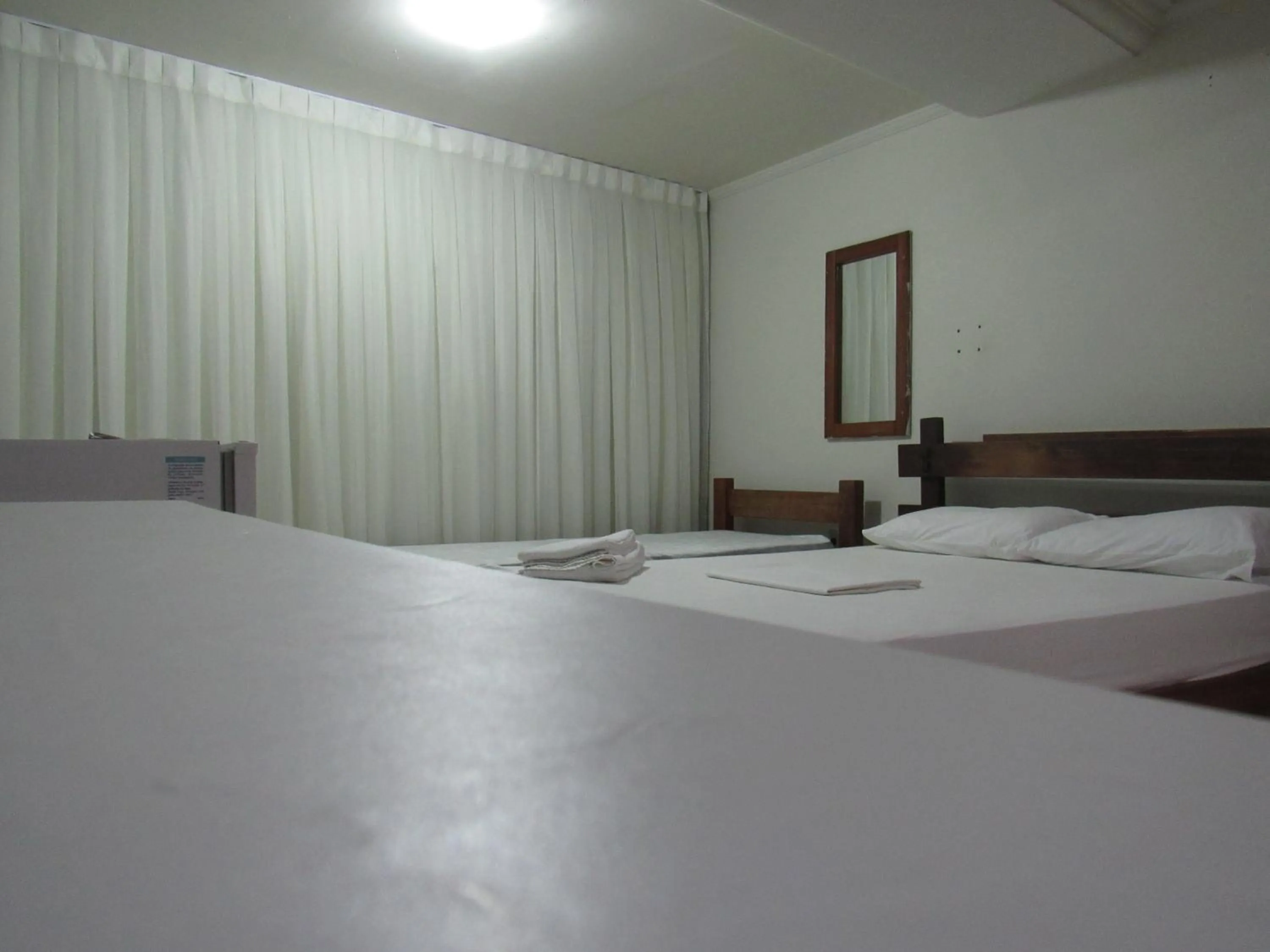 Bed in River Class Hotel