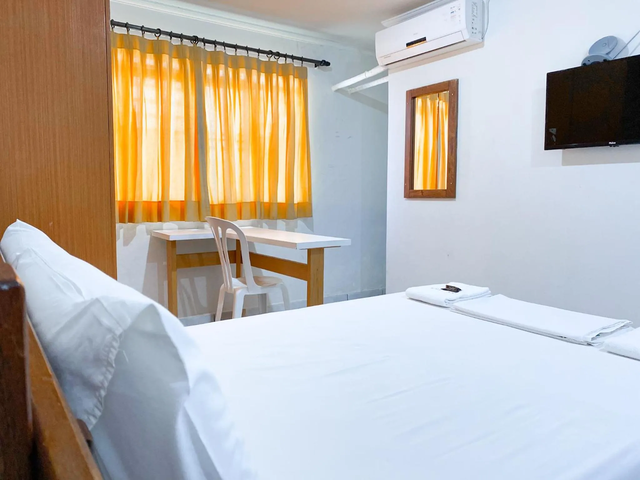 Bed in River Class Hotel