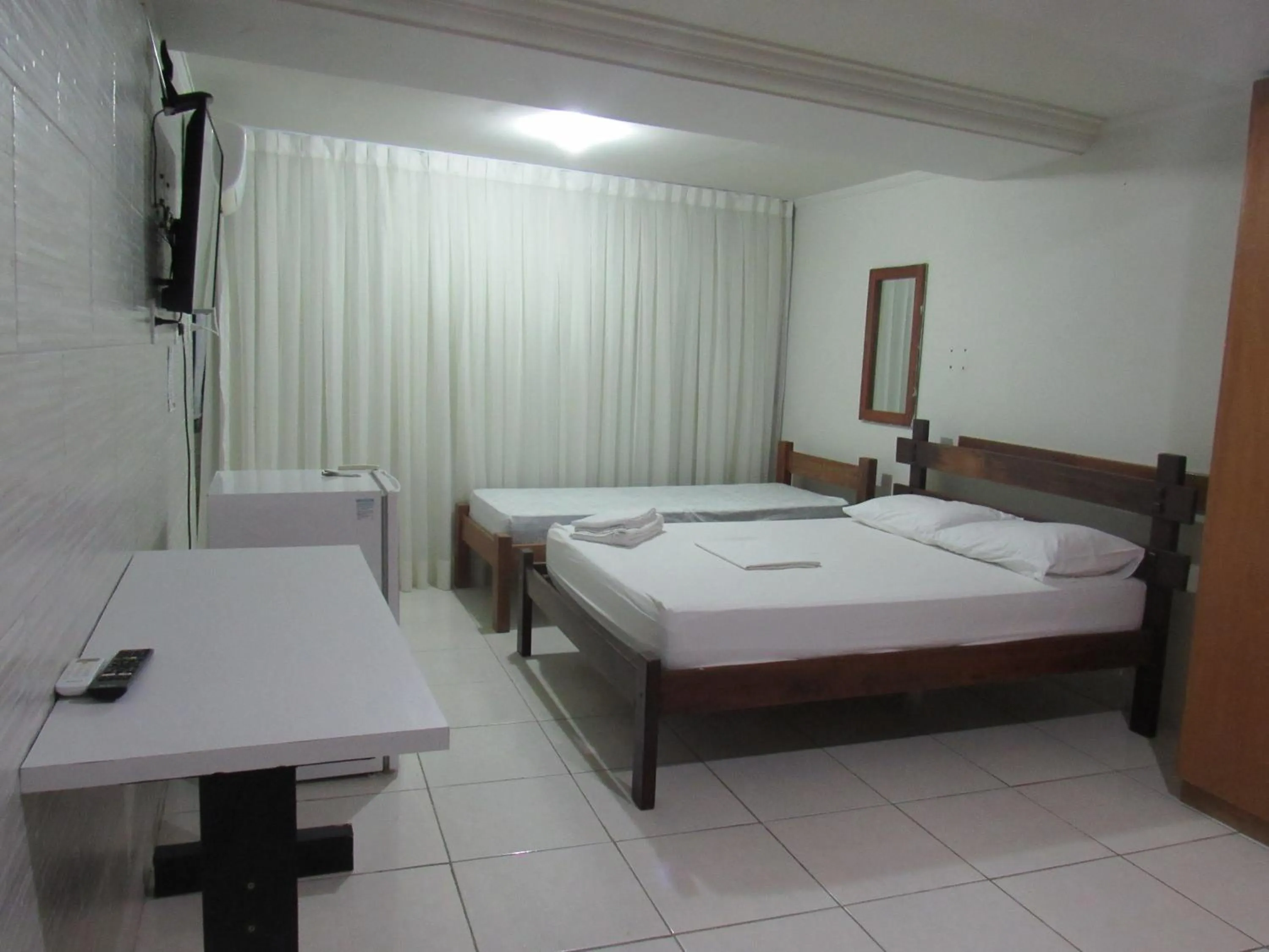 Photo of the whole room, Bed in River Class Hotel