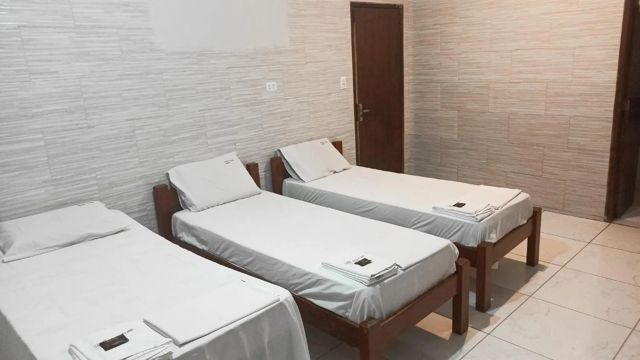 Bed in River Class Hotel