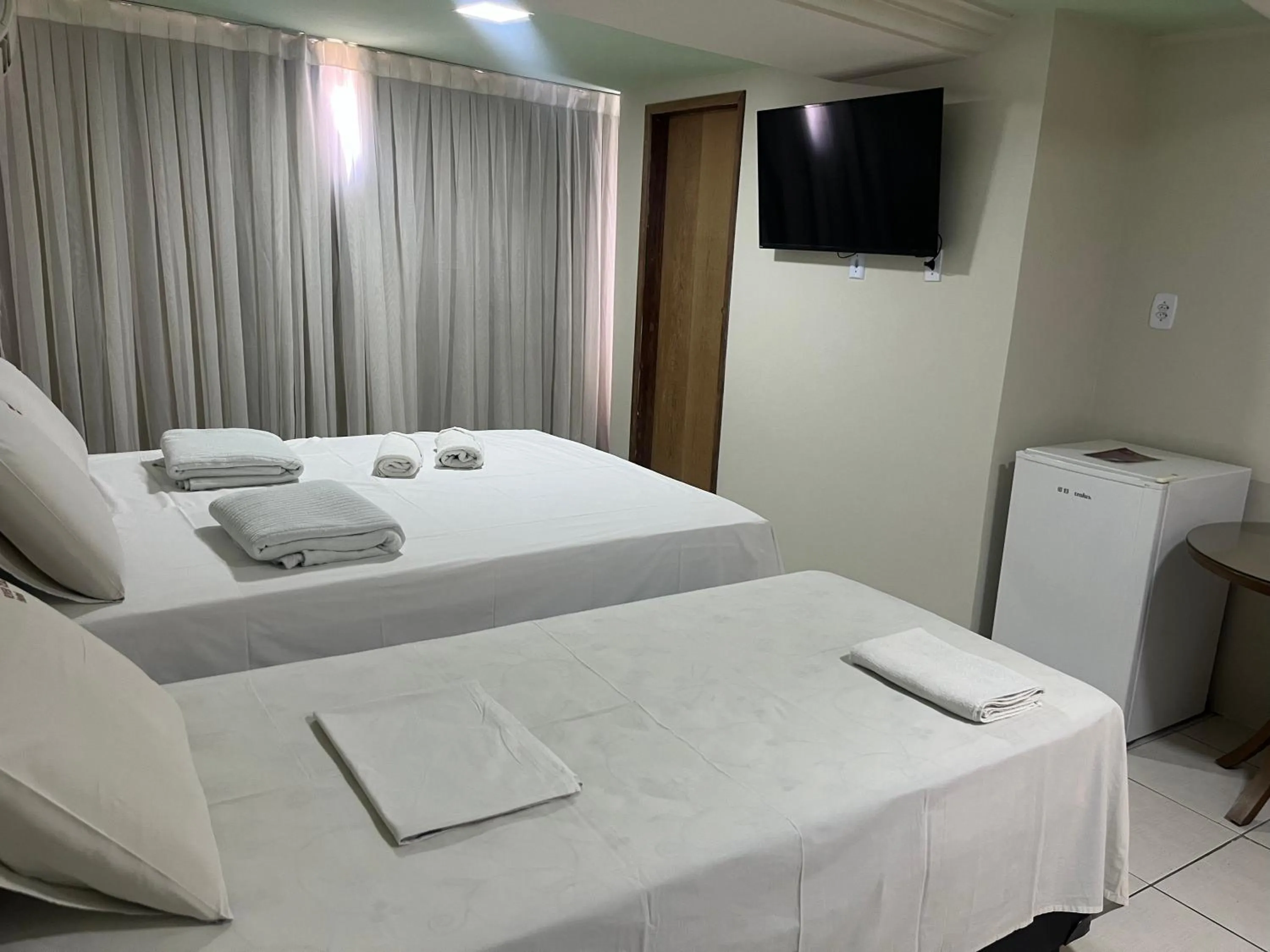 Bed in River Class Hotel