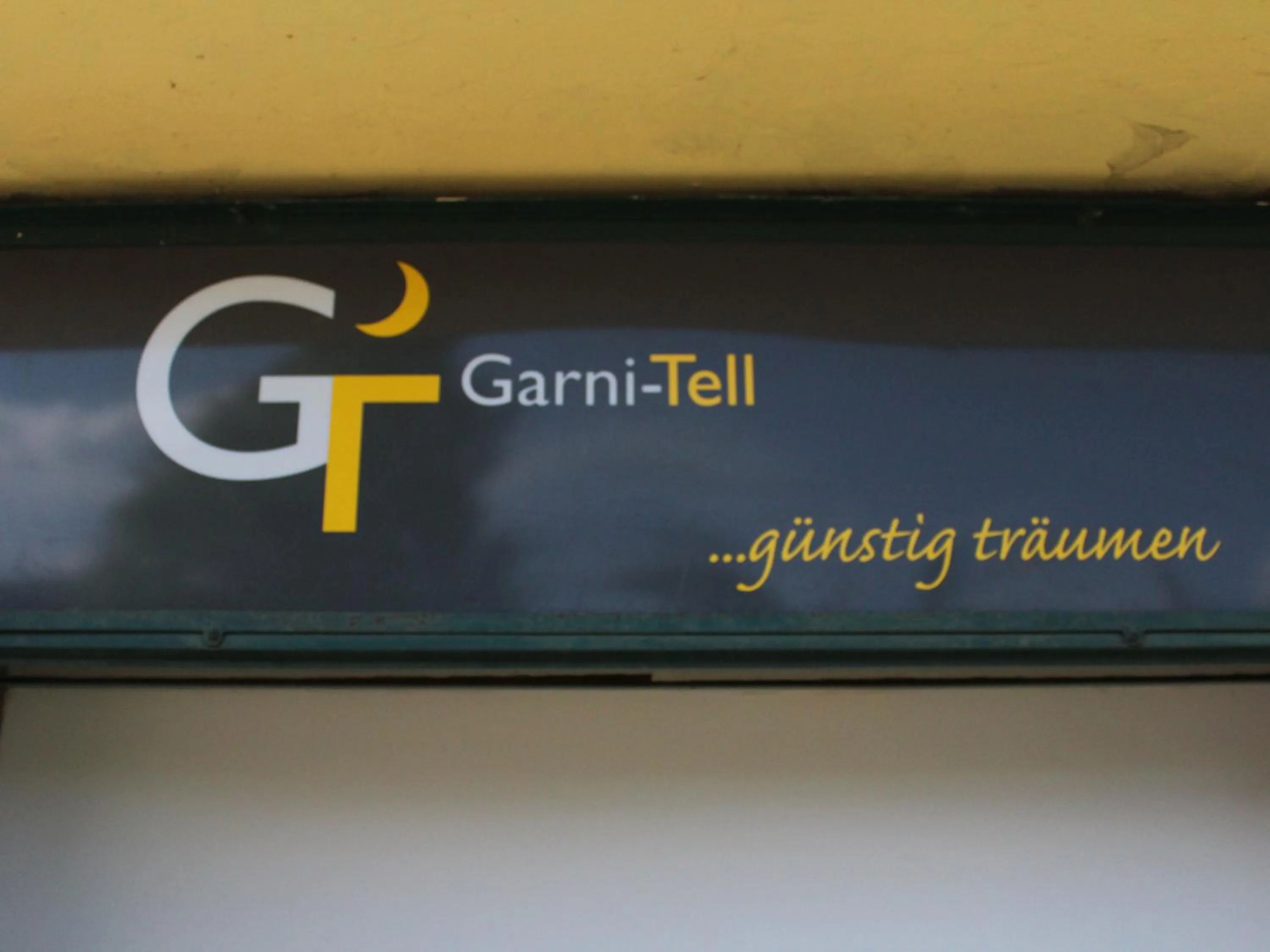 Property logo or sign in Hotel Garni-Tell