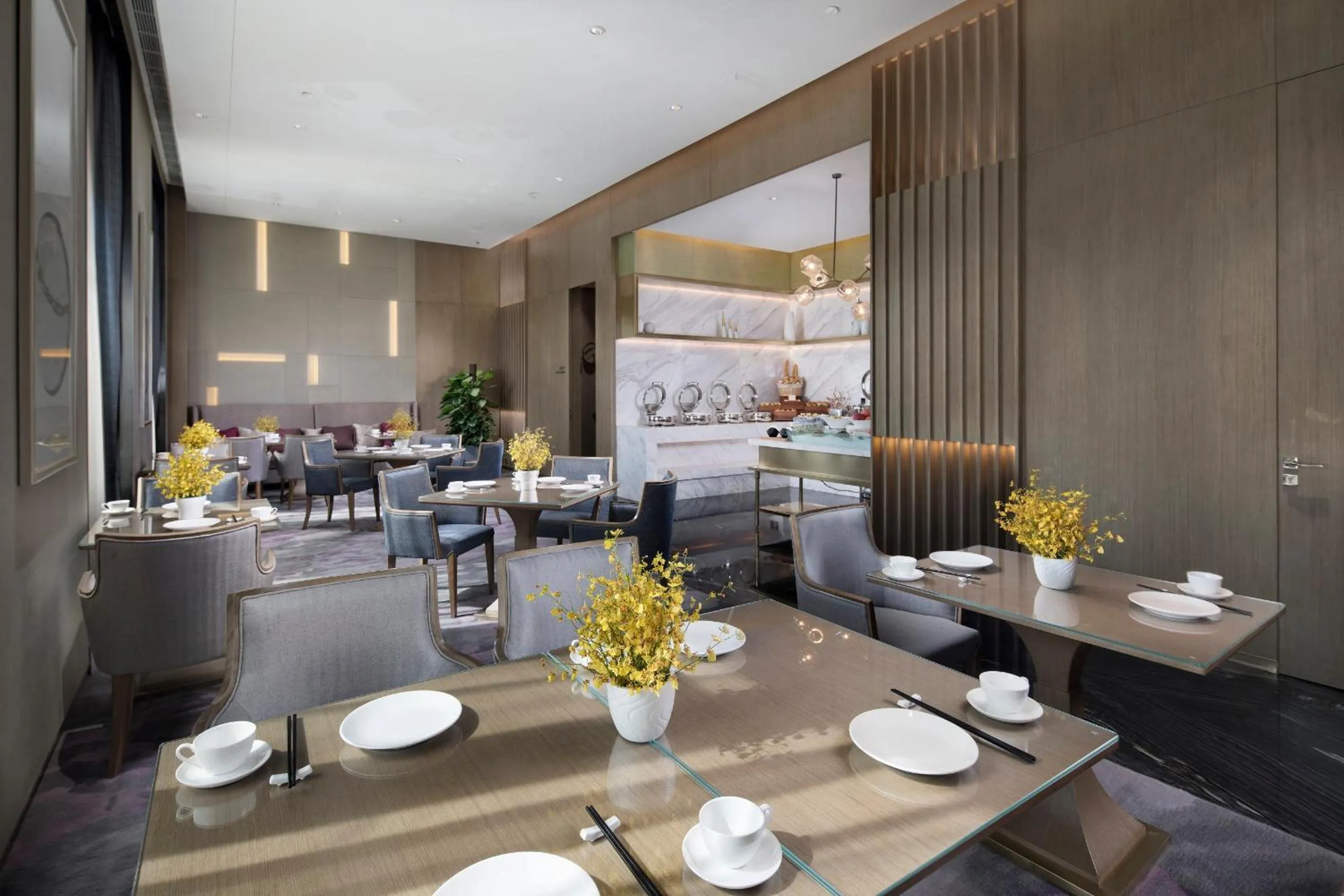 Communal lounge/ TV room in Crowne Plaza Harbin Songbei by IHG