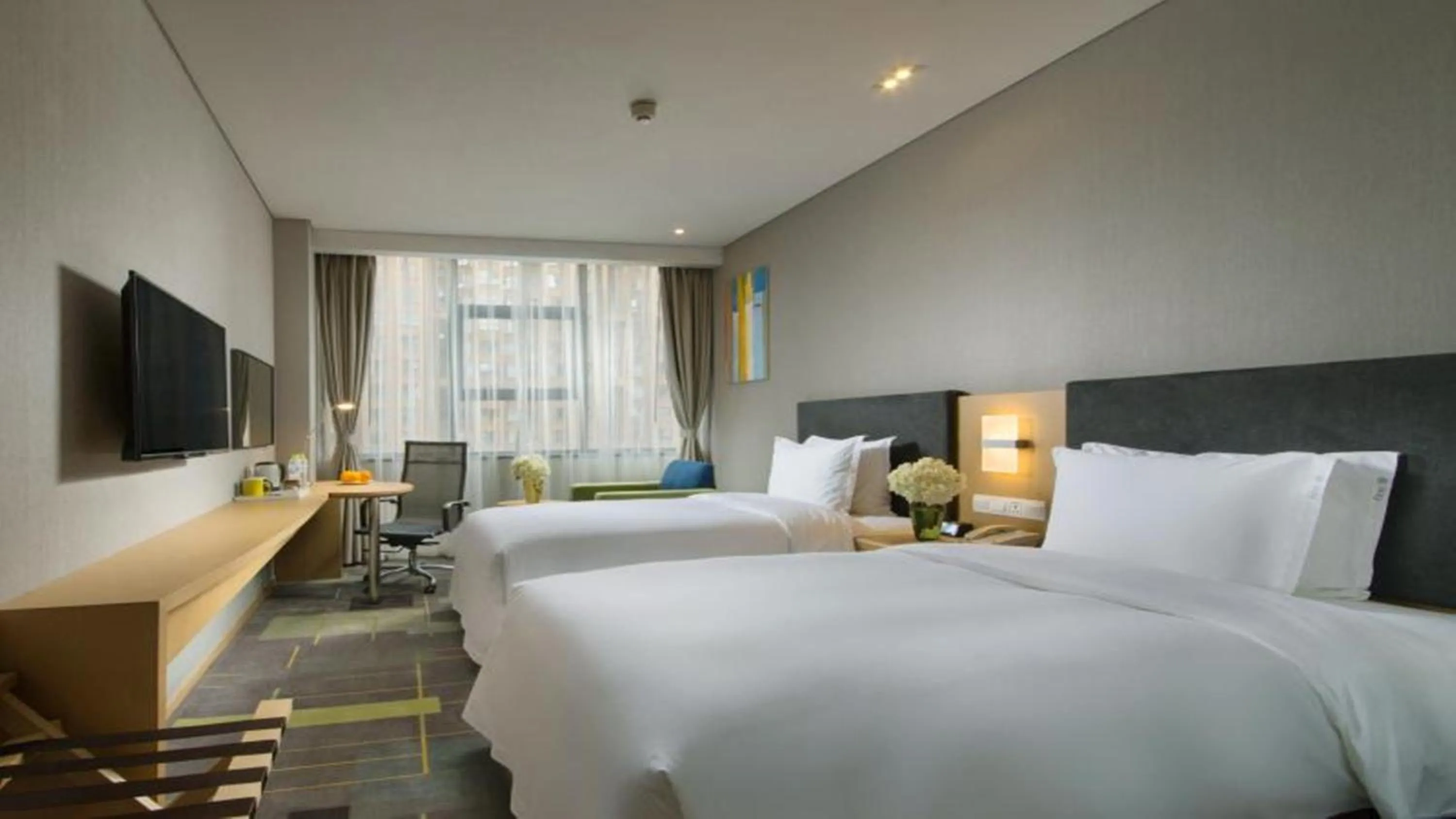 Photo of the whole room, Bed in Holiday Inn Express Chengdu Airport Zone Shuangliu International Airport