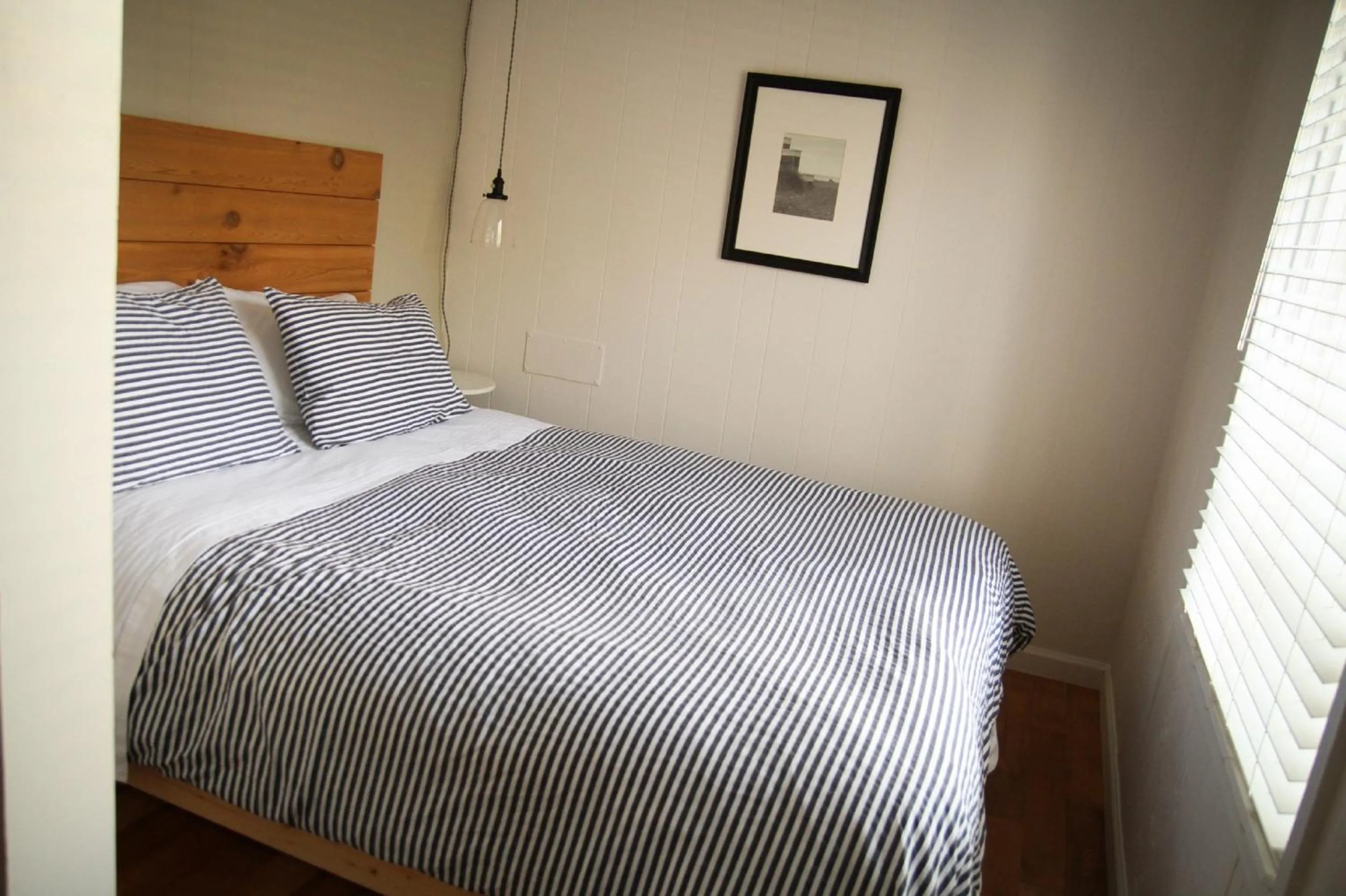 Bed in Boardwalk Cottages