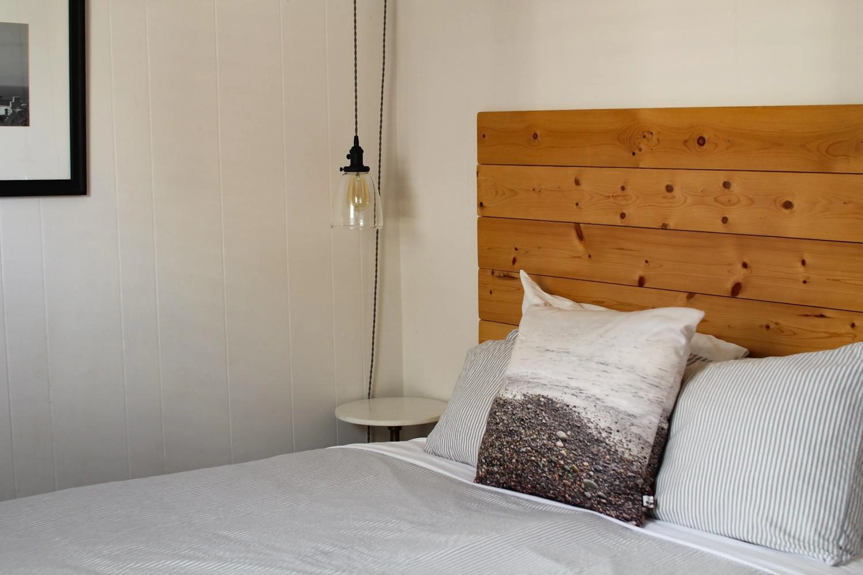 Bed in Boardwalk Cottages
