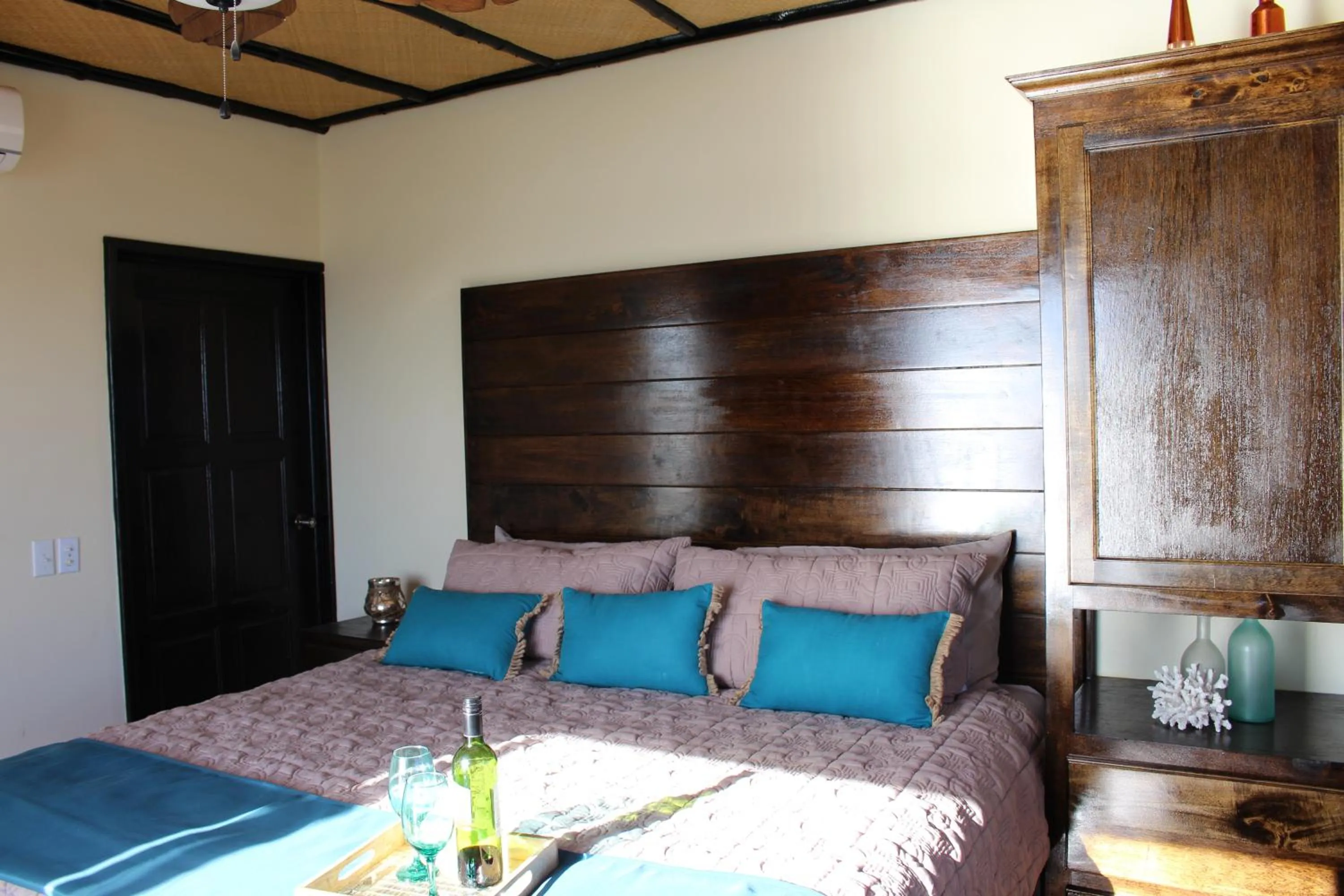 Bed in Lina Point Belize Overwater Resort