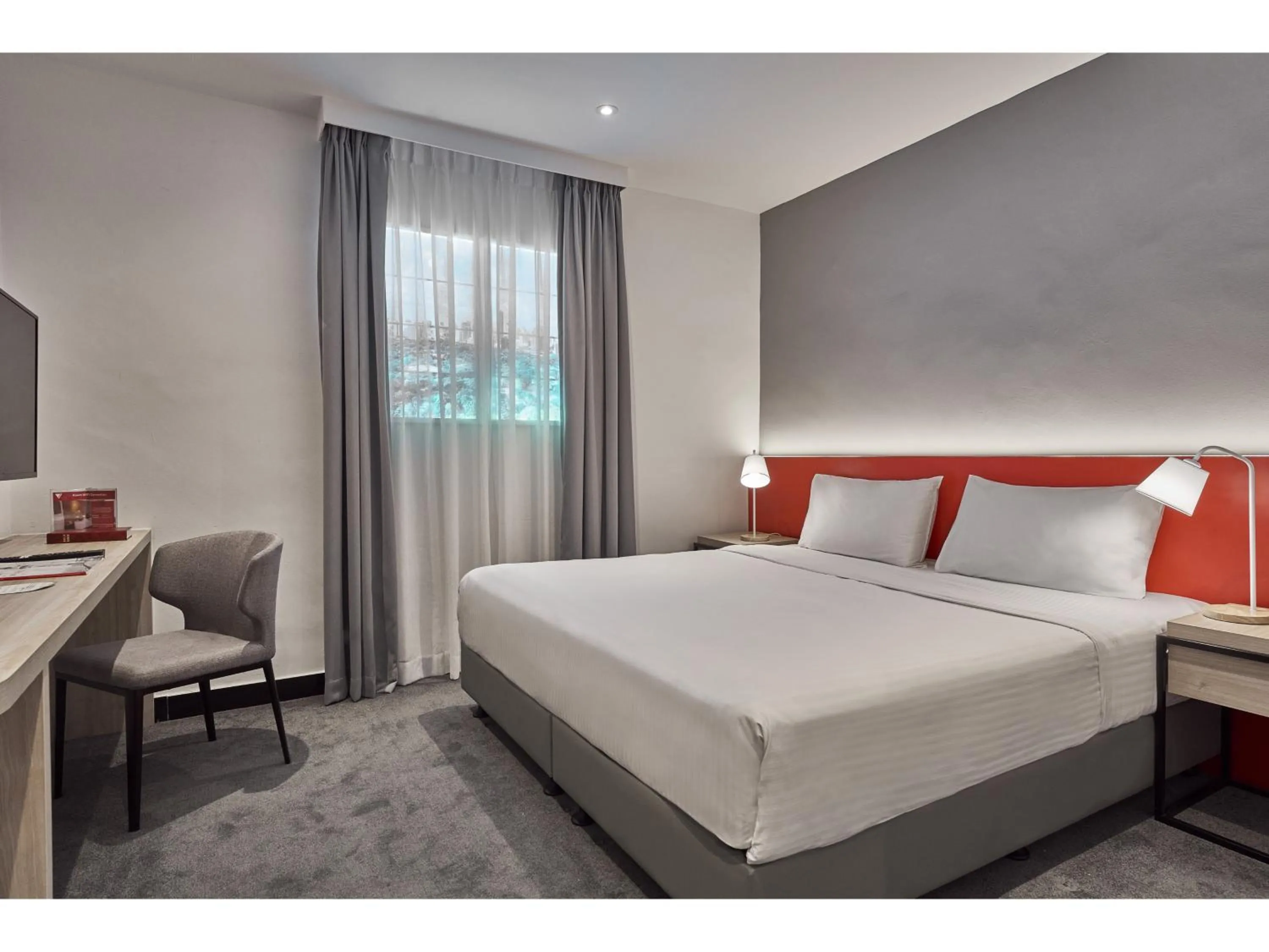 Bed in Metro Y Hotel Singapore