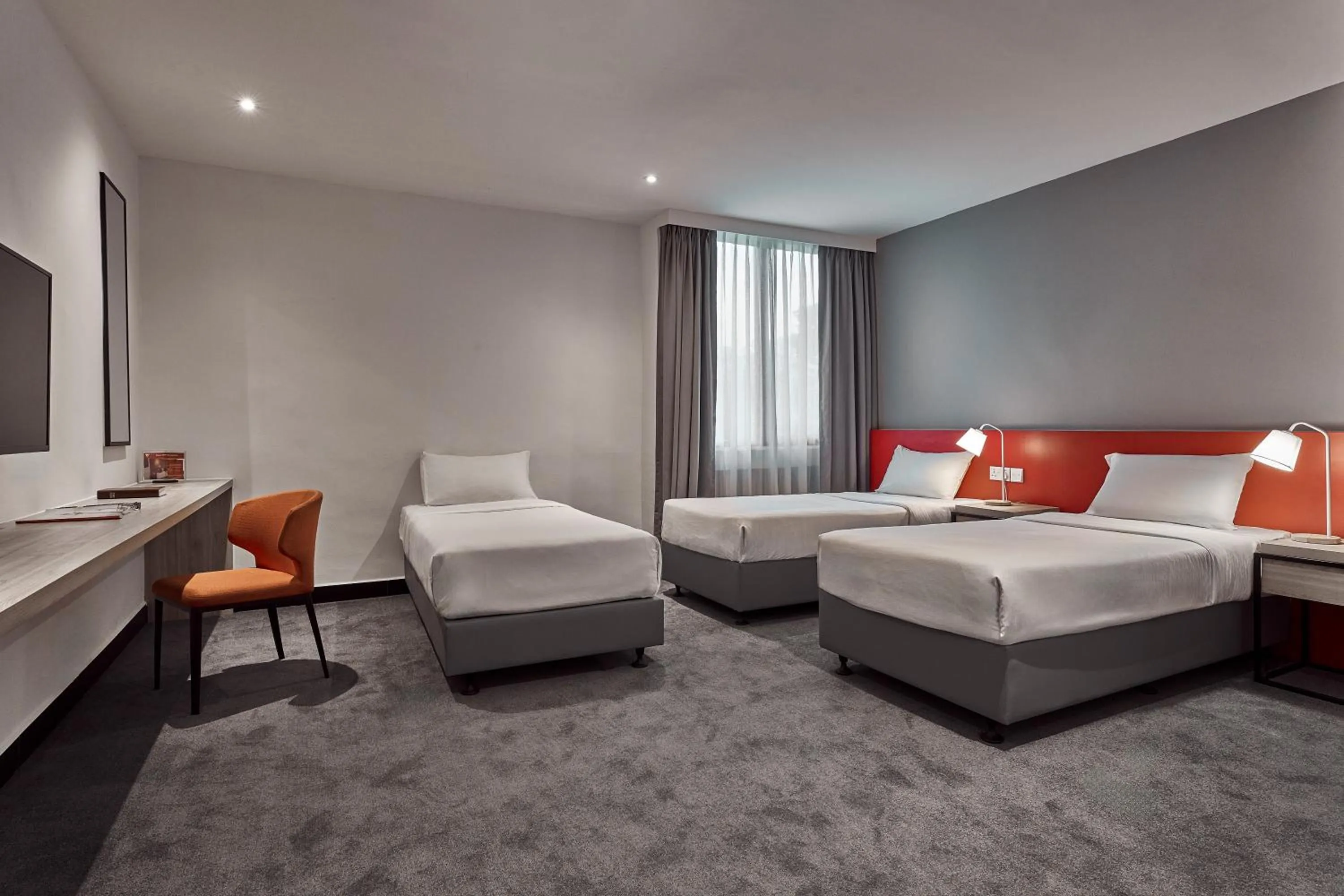 Bed in Metro Y Hotel Singapore