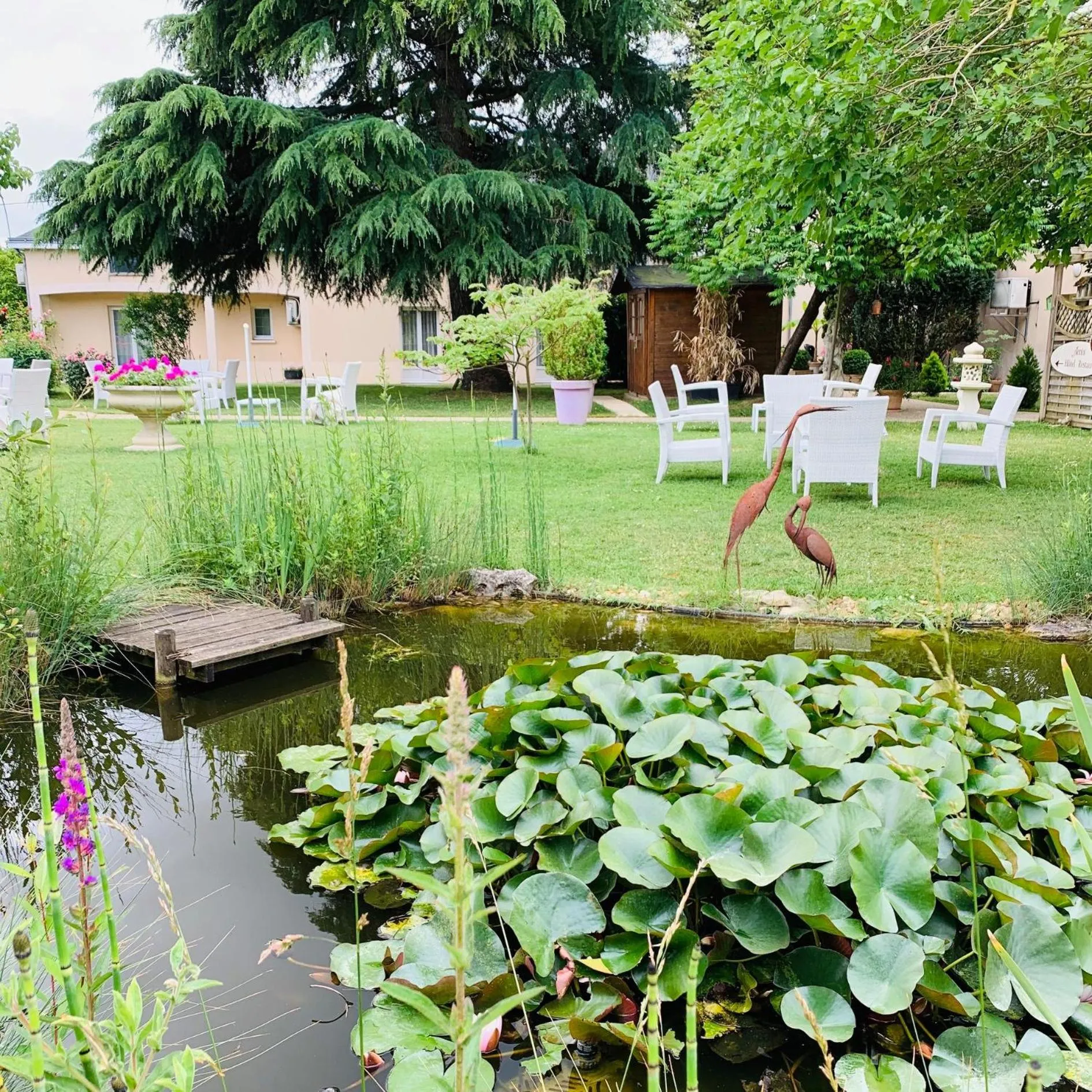 Garden in Logis Auberge Bienvenue