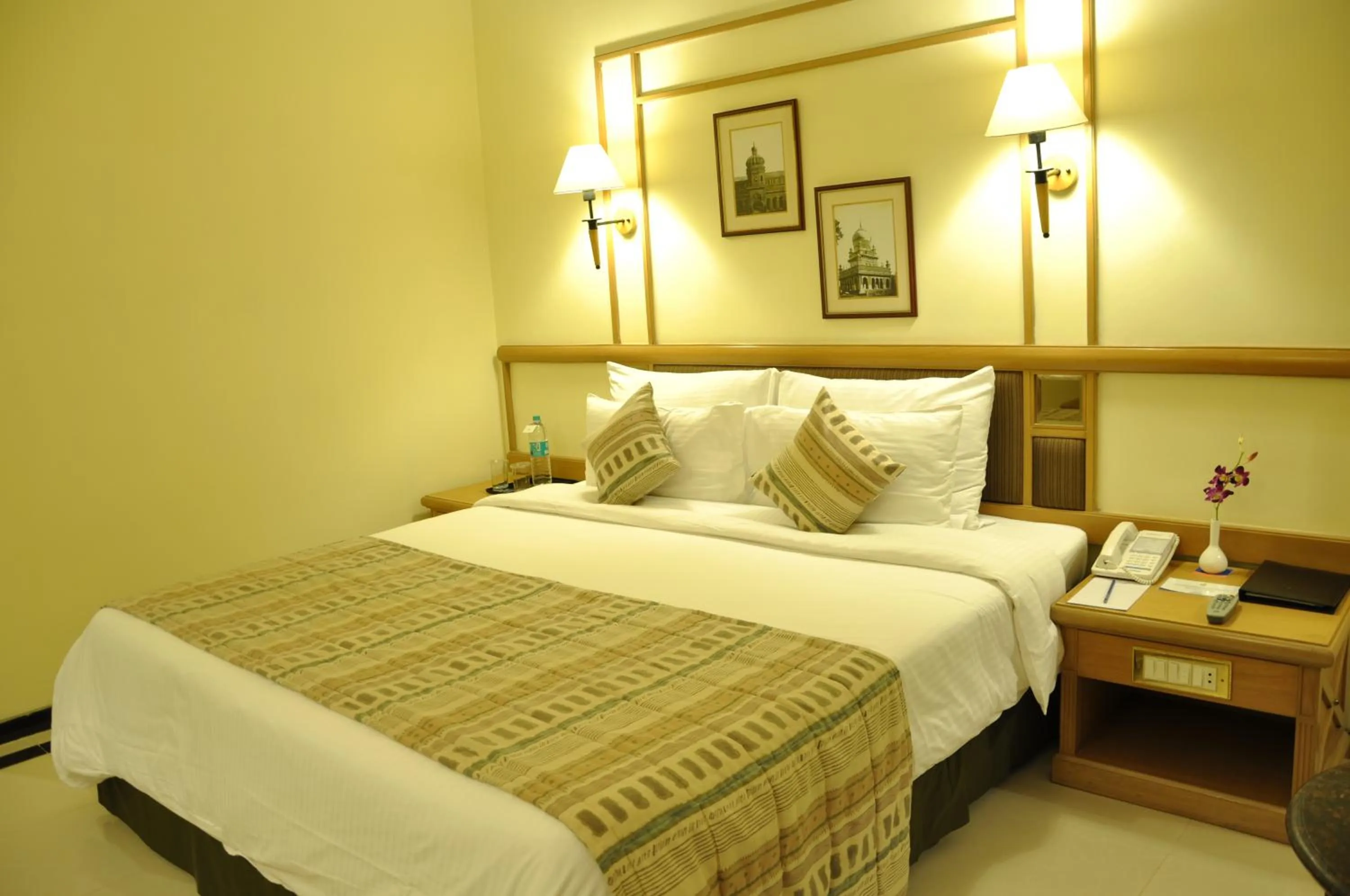 Bed in Aditya Park-A Sarovar Portico Hotel
