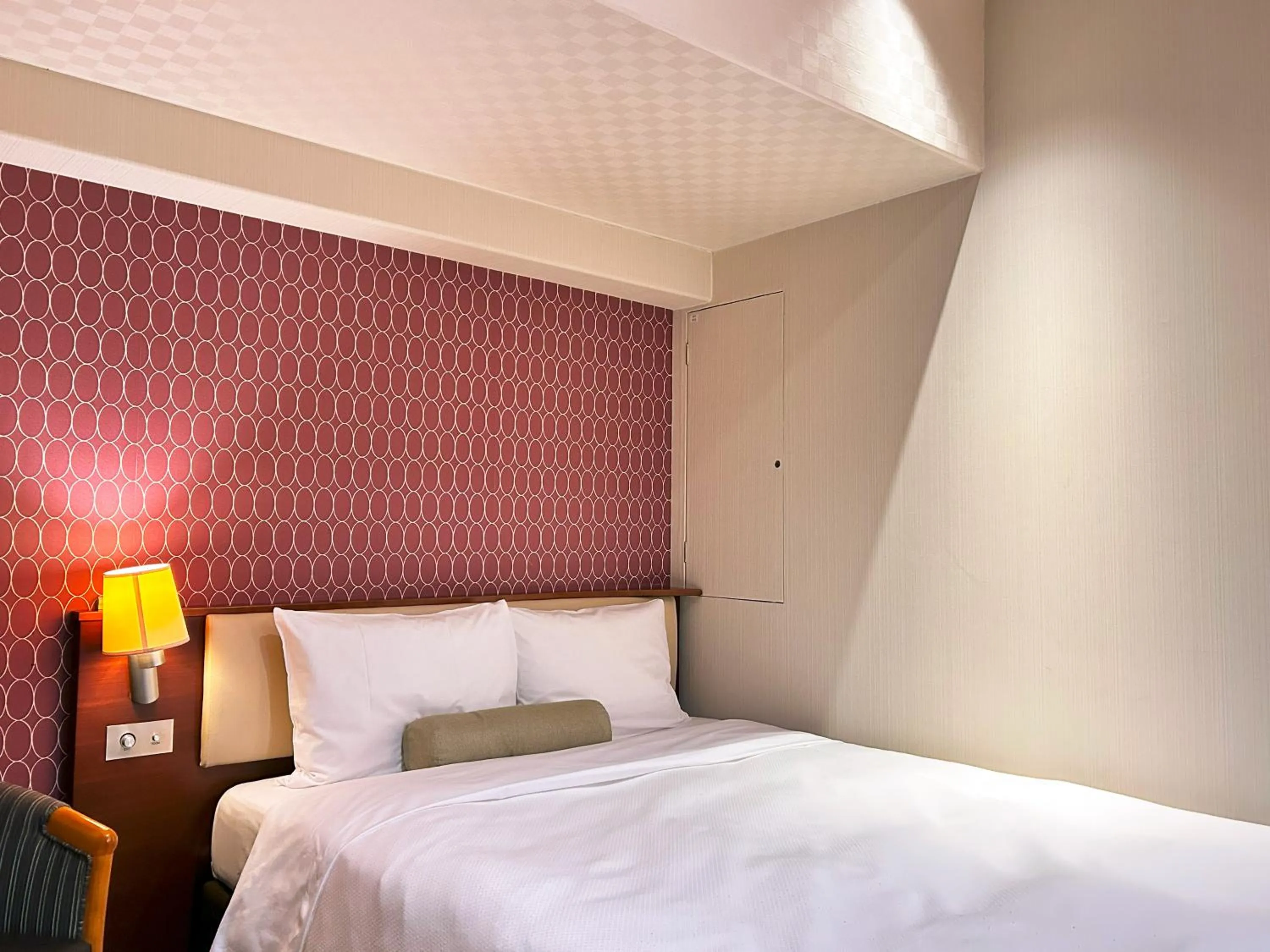 Bed in Nakajimaya Grand Hotel