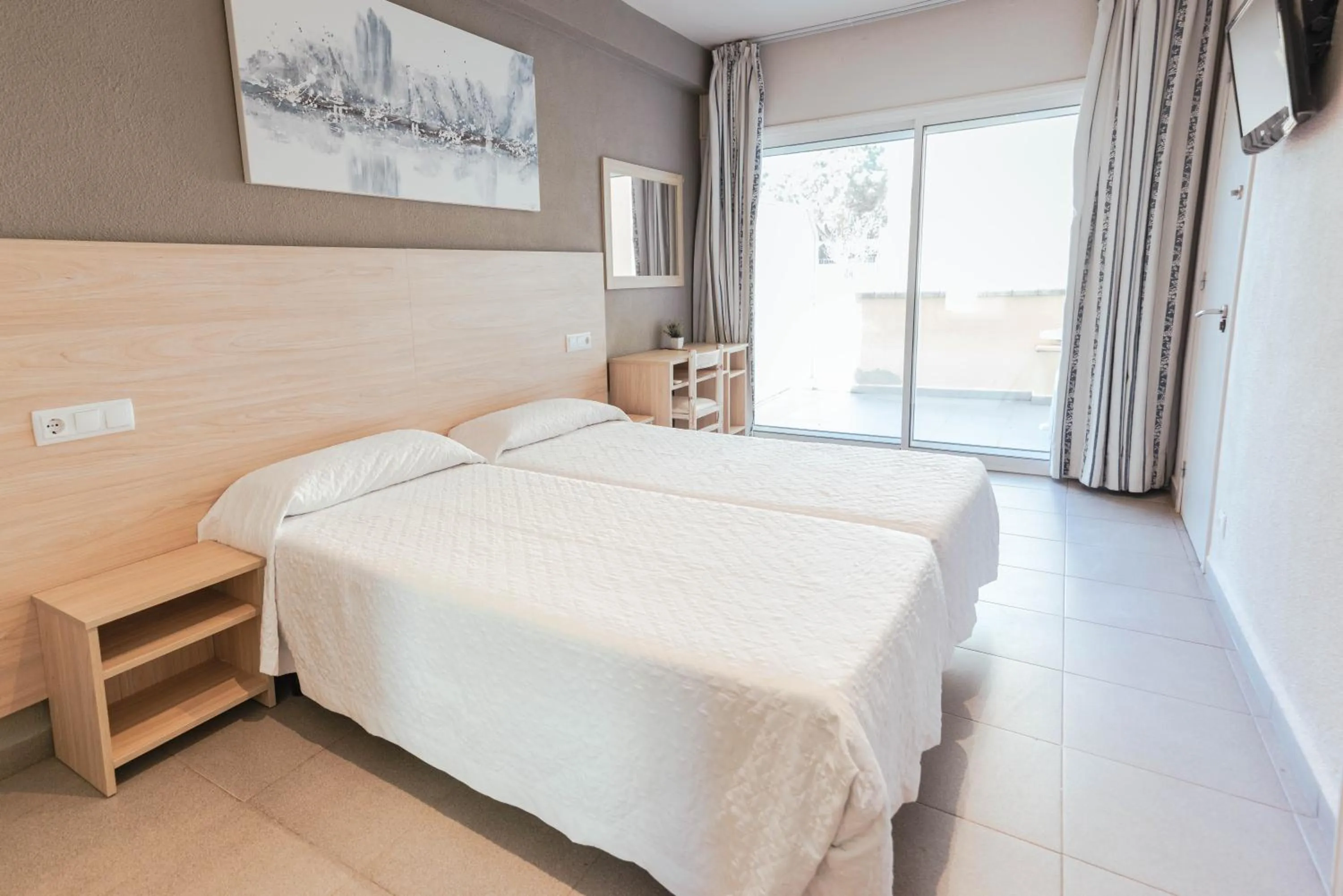 Bed in Hotel S'Agoita