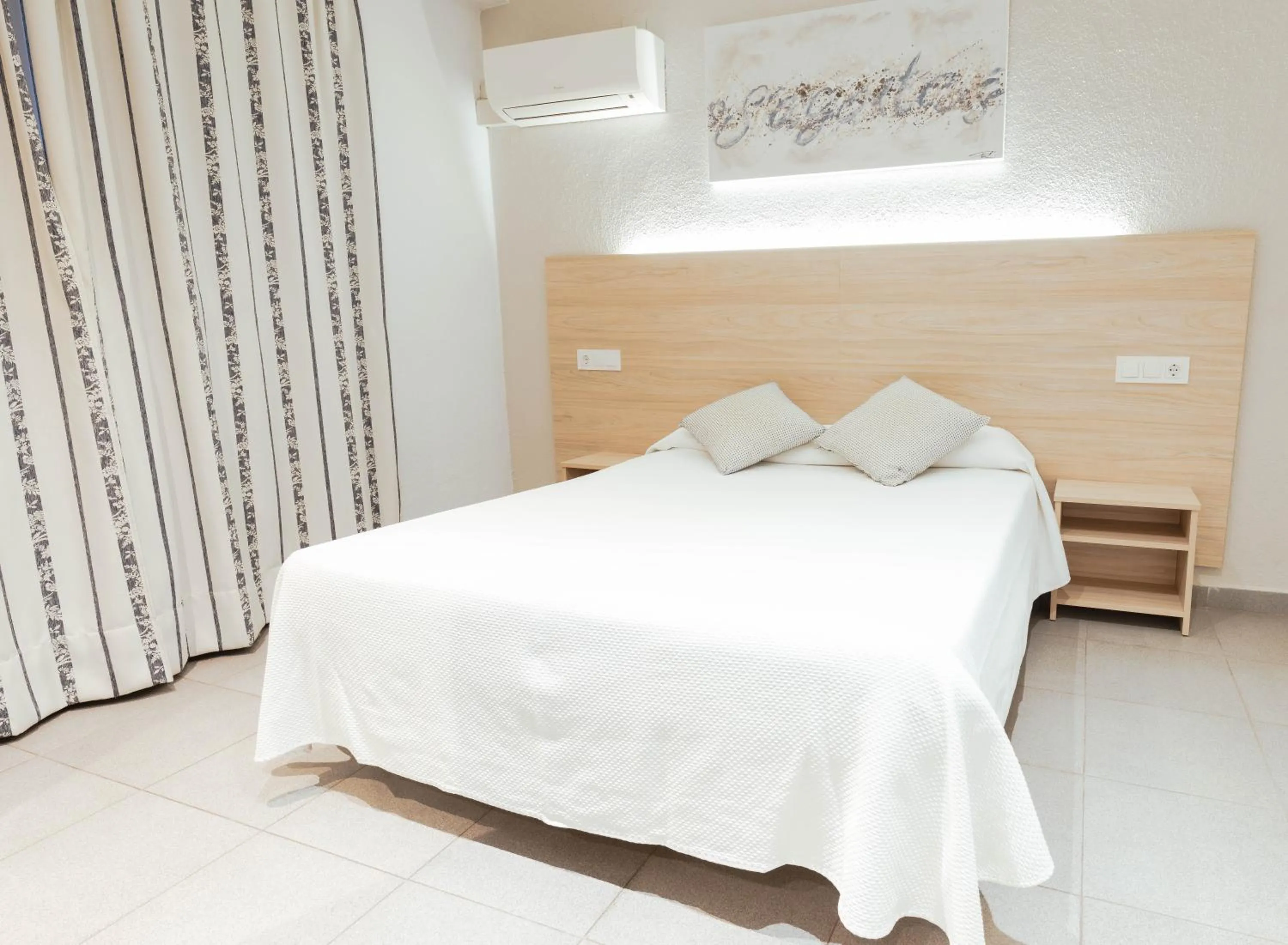 Bed in Hotel S'Agoita