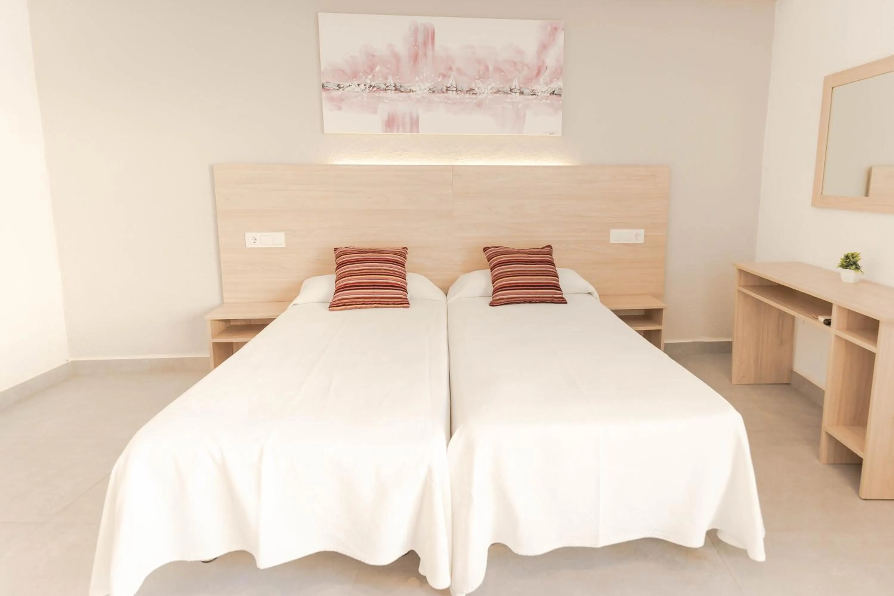 Bed in Hotel S'Agoita