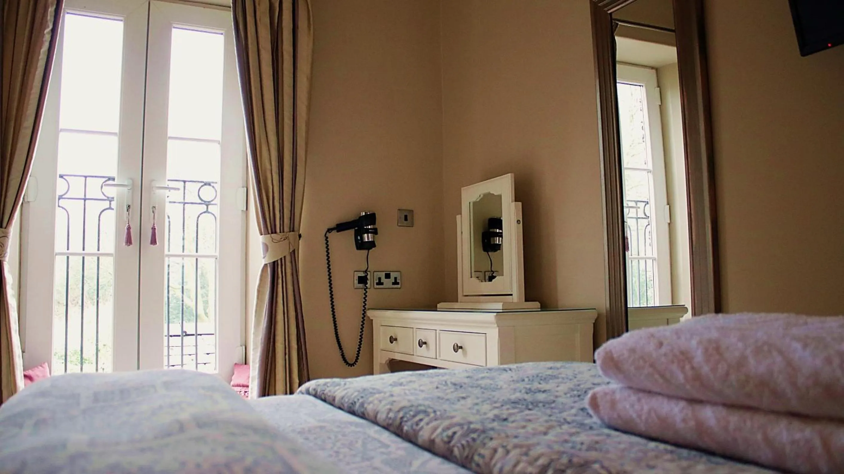 Bed in Bowness Bay Suites