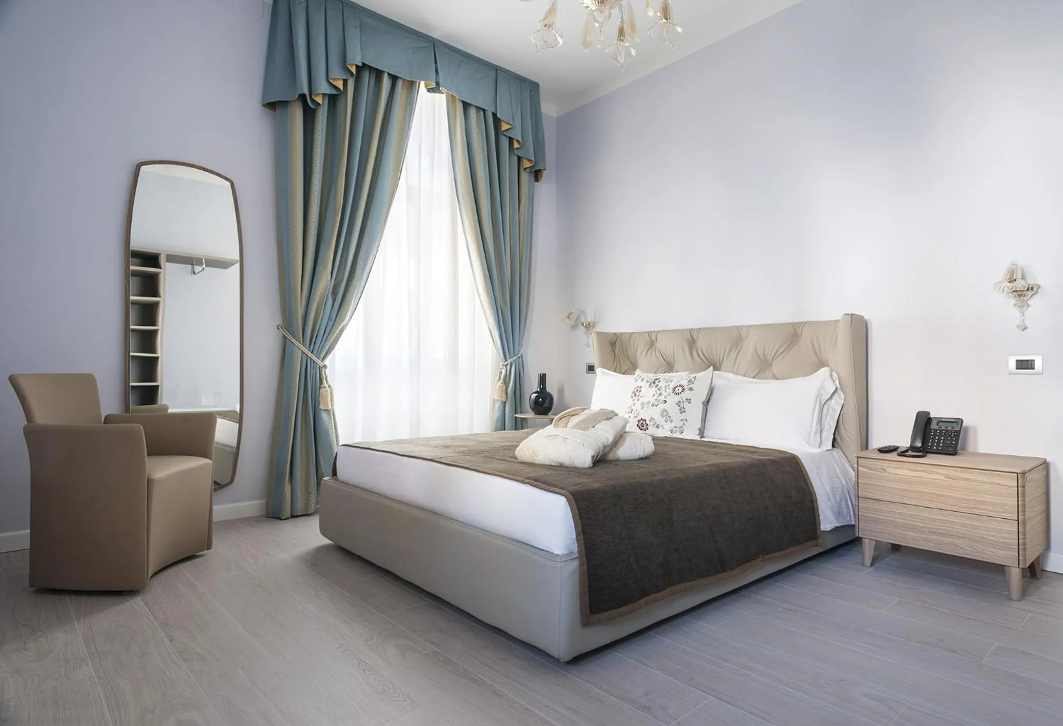 Bed in Les 7 Suites Erica