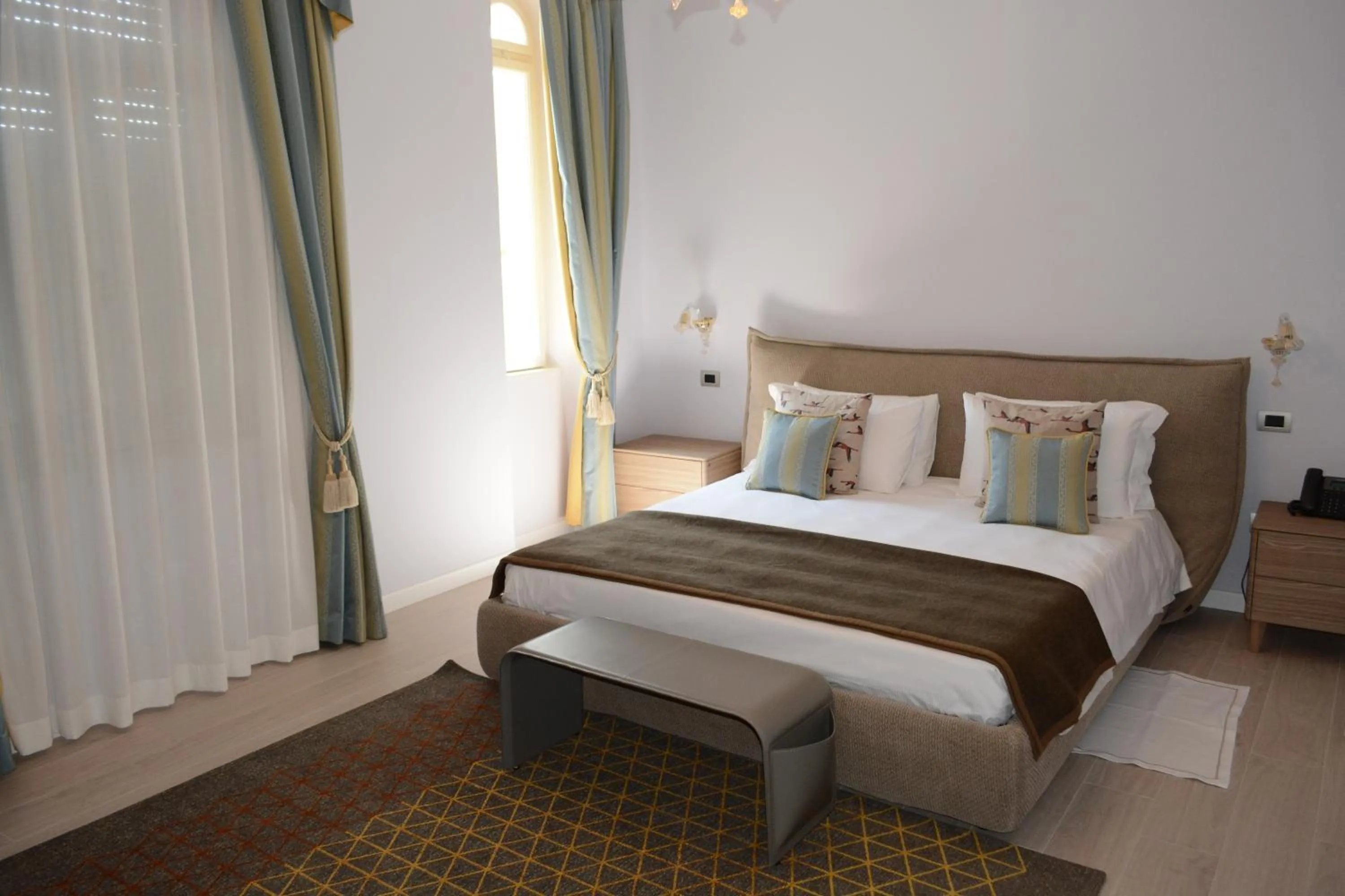 Bed in Les 7 Suites Erica