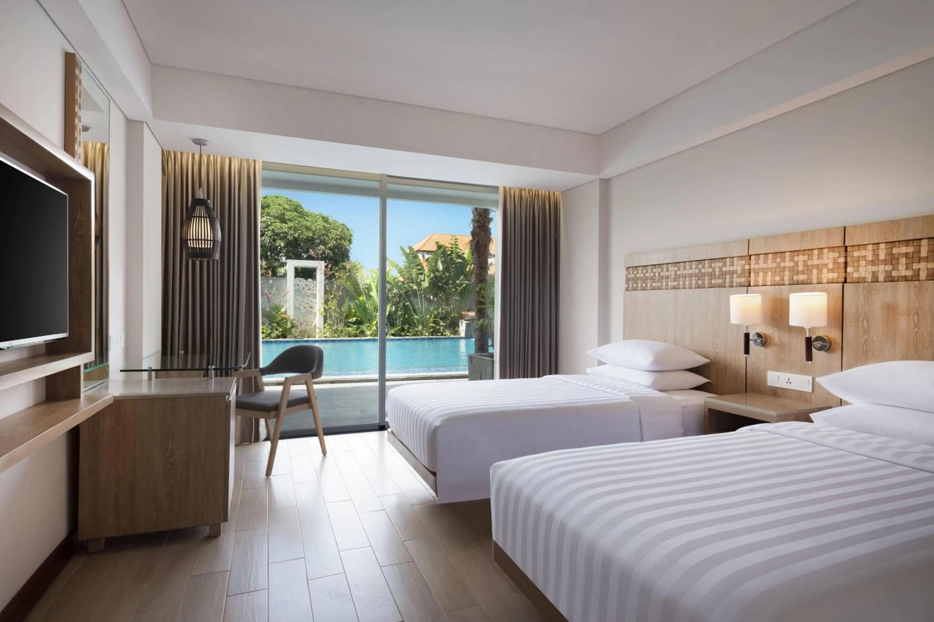 Swimming pool, Bed in Fairfield by Marriott Bali Legian