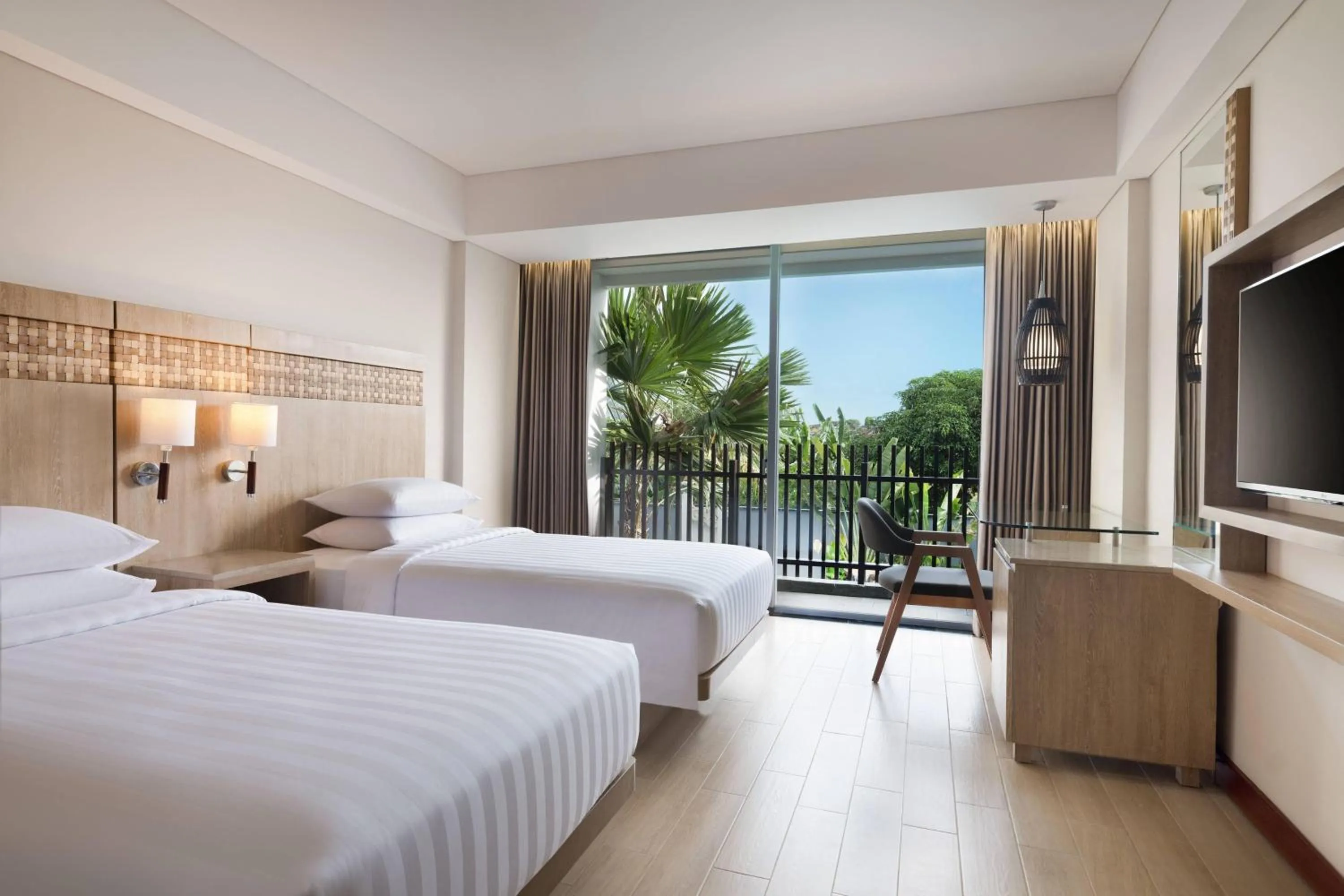 Swimming pool, Bed in Fairfield by Marriott Bali Legian