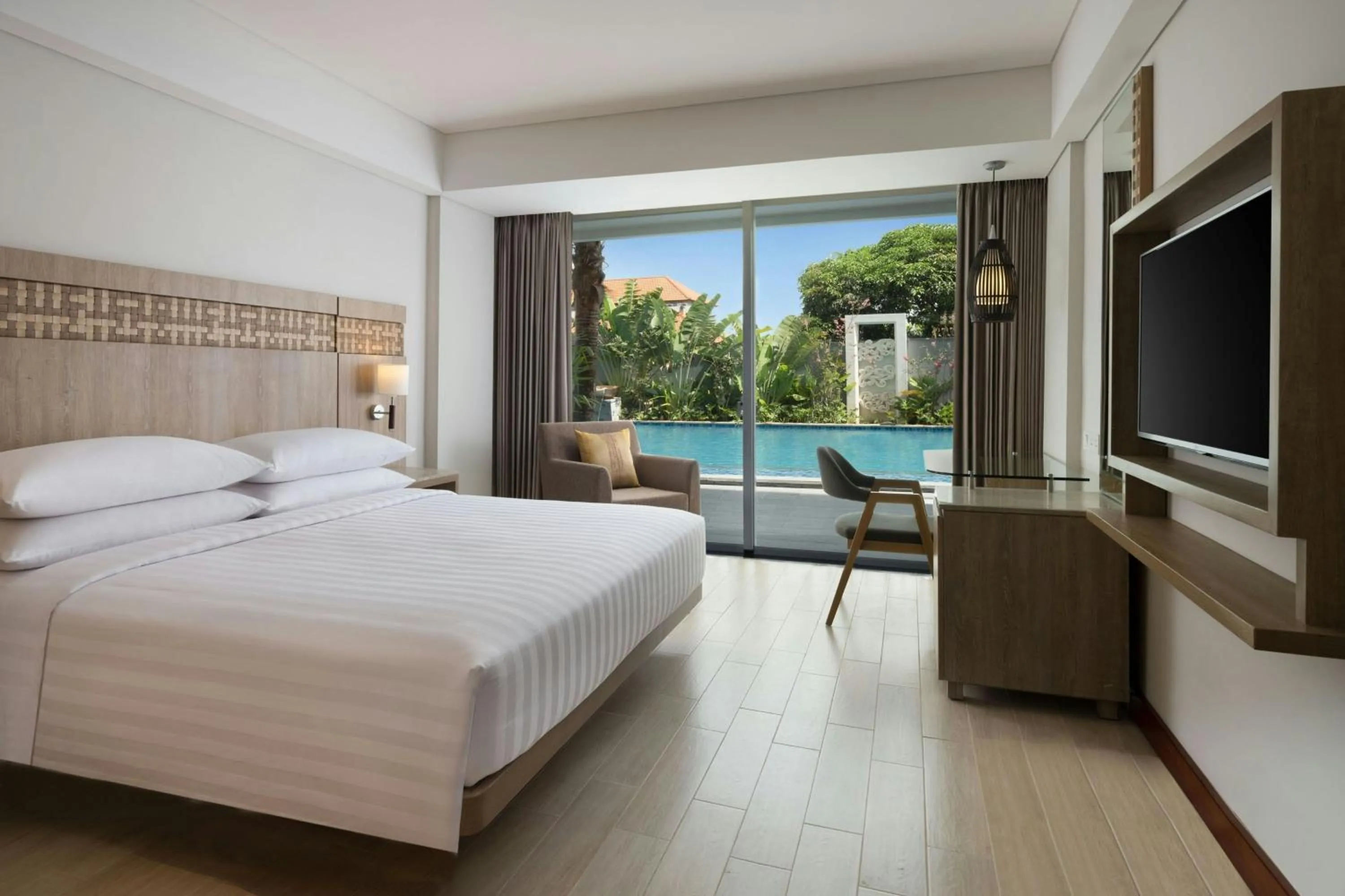 Swimming pool, Bed in Fairfield by Marriott Bali Legian